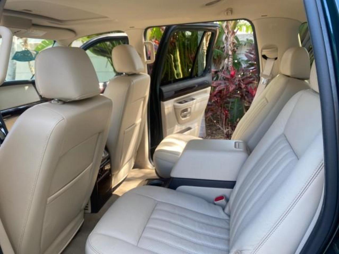 2003 Aspen Green Metallic /Light Parchment Lincoln Aviator Premium SUNROOF LEATHER NAV (5LMEU68H43Z) with an 4.6L DOHC 32-Valve V8 Engine engine, Automatic transmission, located at 4701 North Dixie Hwy, Pompano Beach, FL, 33064, (954) 422-2889, 26.240938, -80.123474 - OUR WEBPAGE FLORIDACARS1.COM HAS OVER 100 PHOTOS AND FREE CARFAX LINK 2003 LINCOLN AVIATOR PREMIUM NAV VIN: 5LMEU68H43ZJ52878 5 L M E U 6 8 H 4 3 Z J 5 2 8 7 8 4 DOOR WAGON/SPORT UTILITY 4.6L V8 F DOHC GASOLINE REAR WHEEL DRIVE Top Features Alloy Wheels Rear View Camera Fold-Away Third Row Running B - Photo#14