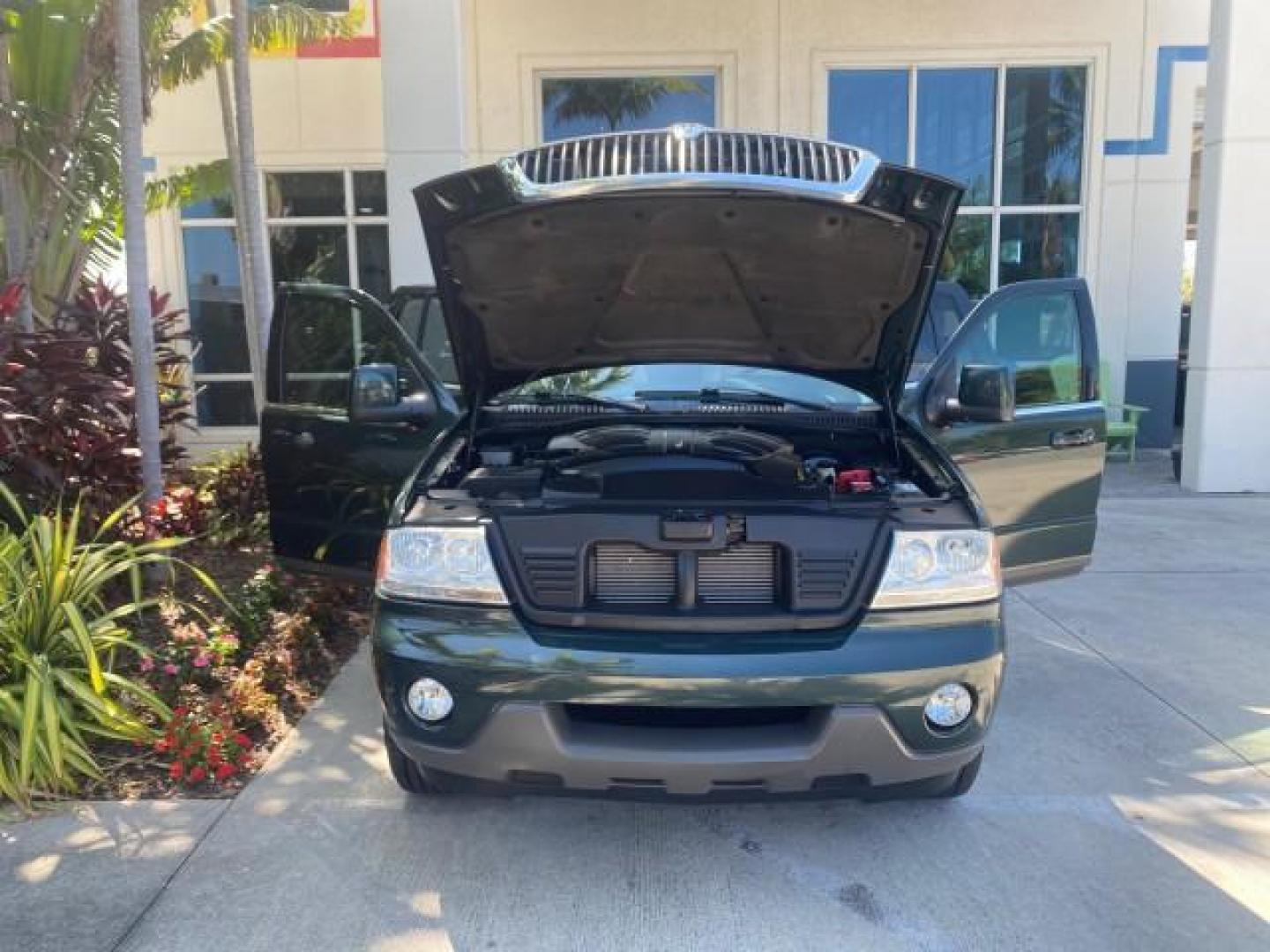 2003 Aspen Green Metallic /Light Parchment Lincoln Aviator Premium SUNROOF LEATHER NAV (5LMEU68H43Z) with an 4.6L DOHC 32-Valve V8 Engine engine, Automatic transmission, located at 4701 North Dixie Hwy, Pompano Beach, FL, 33064, (954) 422-2889, 26.240938, -80.123474 - OUR WEBPAGE FLORIDACARS1.COM HAS OVER 100 PHOTOS AND FREE CARFAX LINK 2003 LINCOLN AVIATOR PREMIUM NAV VIN: 5LMEU68H43ZJ52878 5 L M E U 6 8 H 4 3 Z J 5 2 8 7 8 4 DOOR WAGON/SPORT UTILITY 4.6L V8 F DOHC GASOLINE REAR WHEEL DRIVE Top Features Alloy Wheels Rear View Camera Fold-Away Third Row Running B - Photo#16