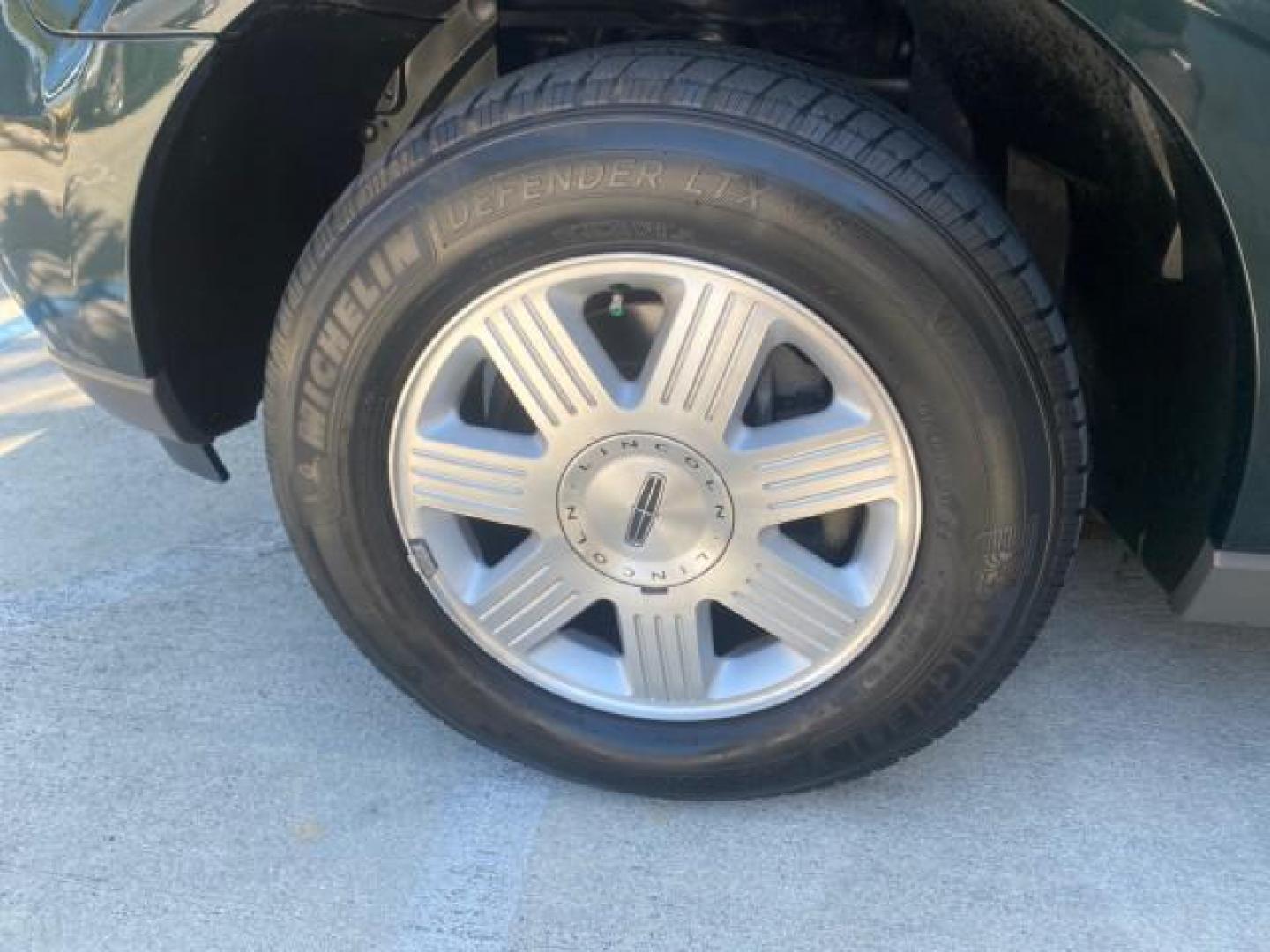 2003 Aspen Green Metallic /Light Parchment Lincoln Aviator Premium SUNROOF LEATHER NAV (5LMEU68H43Z) with an 4.6L DOHC 32-Valve V8 Engine engine, Automatic transmission, located at 4701 North Dixie Hwy, Pompano Beach, FL, 33064, (954) 422-2889, 26.240938, -80.123474 - OUR WEBPAGE FLORIDACARS1.COM HAS OVER 100 PHOTOS AND FREE CARFAX LINK 2003 LINCOLN AVIATOR PREMIUM NAV VIN: 5LMEU68H43ZJ52878 5 L M E U 6 8 H 4 3 Z J 5 2 8 7 8 4 DOOR WAGON/SPORT UTILITY 4.6L V8 F DOHC GASOLINE REAR WHEEL DRIVE Top Features Alloy Wheels Rear View Camera Fold-Away Third Row Running B - Photo#19