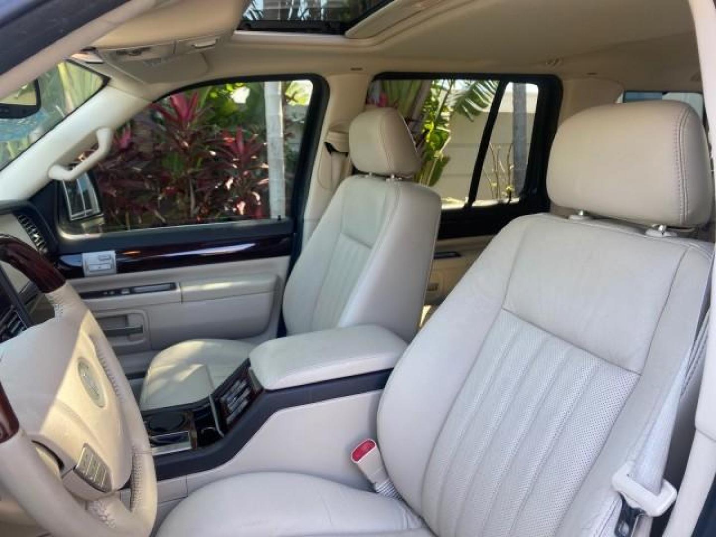2003 Aspen Green Metallic /Light Parchment Lincoln Aviator Premium SUNROOF LEATHER NAV (5LMEU68H43Z) with an 4.6L DOHC 32-Valve V8 Engine engine, Automatic transmission, located at 4701 North Dixie Hwy, Pompano Beach, FL, 33064, (954) 422-2889, 26.240938, -80.123474 - OUR WEBPAGE FLORIDACARS1.COM HAS OVER 100 PHOTOS AND FREE CARFAX LINK 2003 LINCOLN AVIATOR PREMIUM NAV VIN: 5LMEU68H43ZJ52878 5 L M E U 6 8 H 4 3 Z J 5 2 8 7 8 4 DOOR WAGON/SPORT UTILITY 4.6L V8 F DOHC GASOLINE REAR WHEEL DRIVE Top Features Alloy Wheels Rear View Camera Fold-Away Third Row Running B - Photo#34