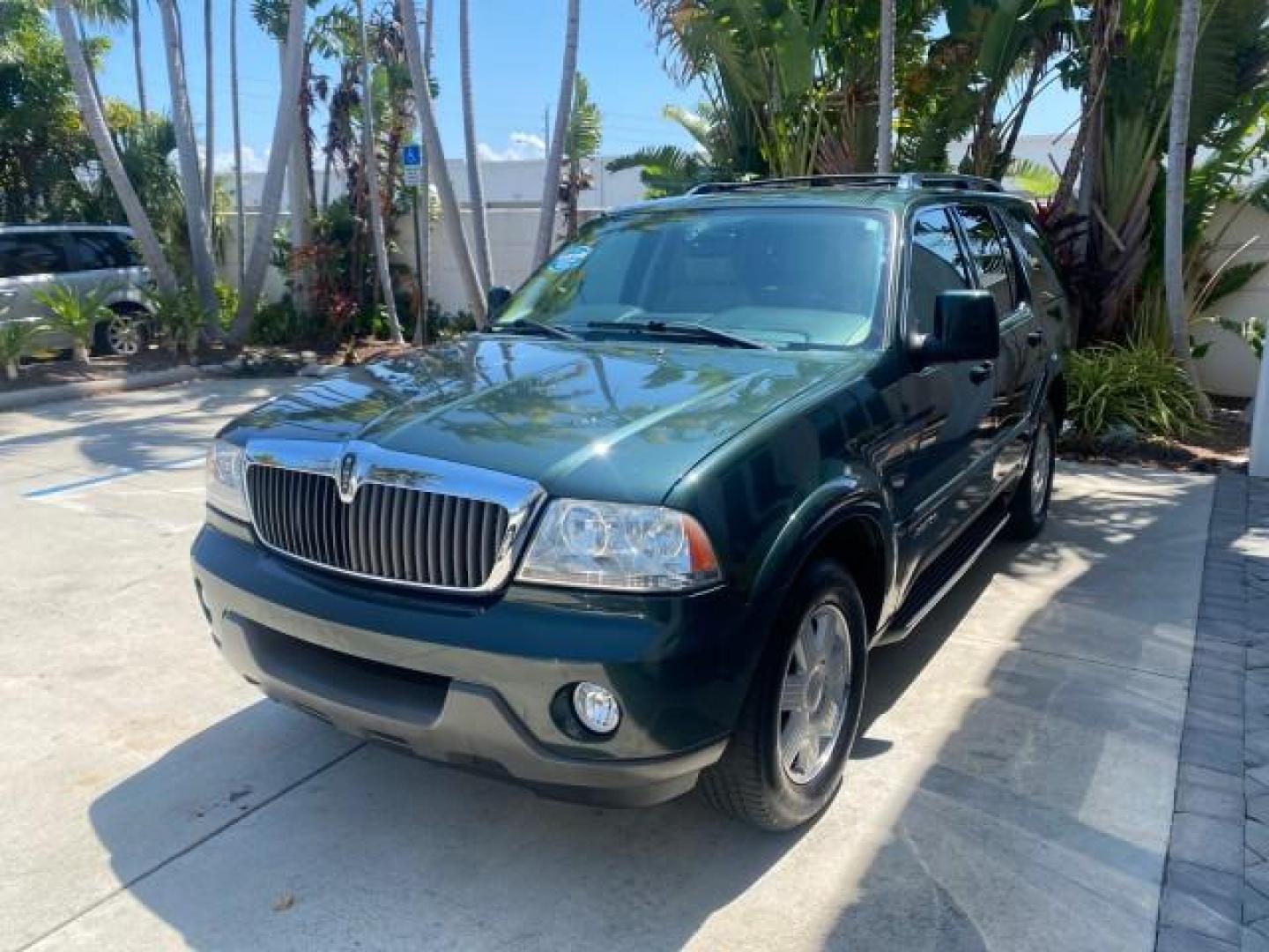 2003 Aspen Green Metallic /Light Parchment Lincoln Aviator Premium SUNROOF LEATHER NAV (5LMEU68H43Z) with an 4.6L DOHC 32-Valve V8 Engine engine, Automatic transmission, located at 4701 North Dixie Hwy, Pompano Beach, FL, 33064, (954) 422-2889, 26.240938, -80.123474 - OUR WEBPAGE FLORIDACARS1.COM HAS OVER 100 PHOTOS AND FREE CARFAX LINK 2003 LINCOLN AVIATOR PREMIUM NAV VIN: 5LMEU68H43ZJ52878 5 L M E U 6 8 H 4 3 Z J 5 2 8 7 8 4 DOOR WAGON/SPORT UTILITY 4.6L V8 F DOHC GASOLINE REAR WHEEL DRIVE Top Features Alloy Wheels Rear View Camera Fold-Away Third Row Running B - Photo#3