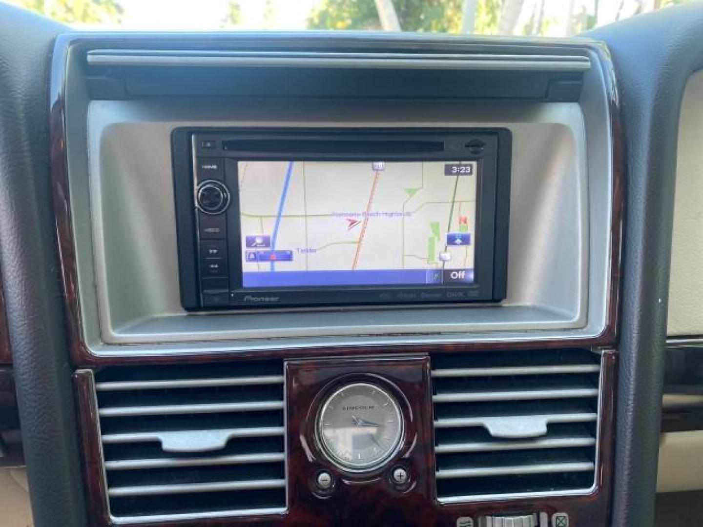 2003 Aspen Green Metallic /Light Parchment Lincoln Aviator Premium SUNROOF LEATHER NAV (5LMEU68H43Z) with an 4.6L DOHC 32-Valve V8 Engine engine, Automatic transmission, located at 4701 North Dixie Hwy, Pompano Beach, FL, 33064, (954) 422-2889, 26.240938, -80.123474 - OUR WEBPAGE FLORIDACARS1.COM HAS OVER 100 PHOTOS AND FREE CARFAX LINK 2003 LINCOLN AVIATOR PREMIUM NAV VIN: 5LMEU68H43ZJ52878 5 L M E U 6 8 H 4 3 Z J 5 2 8 7 8 4 DOOR WAGON/SPORT UTILITY 4.6L V8 F DOHC GASOLINE REAR WHEEL DRIVE Top Features Alloy Wheels Rear View Camera Fold-Away Third Row Running B - Photo#52