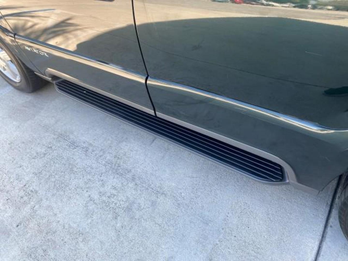 2003 Aspen Green Metallic /Light Parchment Lincoln Aviator Premium SUNROOF LEATHER NAV (5LMEU68H43Z) with an 4.6L DOHC 32-Valve V8 Engine engine, Automatic transmission, located at 4701 North Dixie Hwy, Pompano Beach, FL, 33064, (954) 422-2889, 26.240938, -80.123474 - OUR WEBPAGE FLORIDACARS1.COM HAS OVER 100 PHOTOS AND FREE CARFAX LINK 2003 LINCOLN AVIATOR PREMIUM NAV VIN: 5LMEU68H43ZJ52878 5 L M E U 6 8 H 4 3 Z J 5 2 8 7 8 4 DOOR WAGON/SPORT UTILITY 4.6L V8 F DOHC GASOLINE REAR WHEEL DRIVE Top Features Alloy Wheels Rear View Camera Fold-Away Third Row Running B - Photo#57