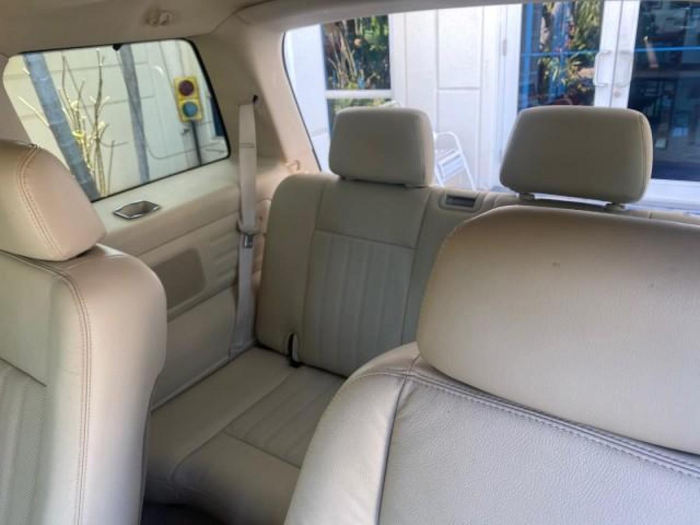 2003 Aspen Green Metallic /Light Parchment Lincoln Aviator Premium SUNROOF LEATHER NAV (5LMEU68H43Z) with an 4.6L DOHC 32-Valve V8 Engine engine, Automatic transmission, located at 4701 North Dixie Hwy, Pompano Beach, FL, 33064, (954) 422-2889, 26.240938, -80.123474 - OUR WEBPAGE FLORIDACARS1.COM HAS OVER 100 PHOTOS AND FREE CARFAX LINK 2003 LINCOLN AVIATOR PREMIUM NAV VIN: 5LMEU68H43ZJ52878 5 L M E U 6 8 H 4 3 Z J 5 2 8 7 8 4 DOOR WAGON/SPORT UTILITY 4.6L V8 F DOHC GASOLINE REAR WHEEL DRIVE Top Features Alloy Wheels Rear View Camera Fold-Away Third Row Running B - Photo#64