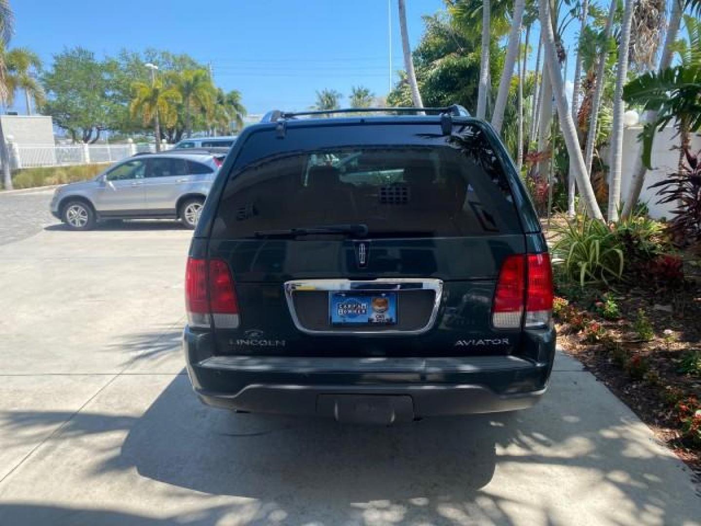 2003 Aspen Green Metallic /Light Parchment Lincoln Aviator Premium SUNROOF LEATHER NAV (5LMEU68H43Z) with an 4.6L DOHC 32-Valve V8 Engine engine, Automatic transmission, located at 4701 North Dixie Hwy, Pompano Beach, FL, 33064, (954) 422-2889, 26.240938, -80.123474 - OUR WEBPAGE FLORIDACARS1.COM HAS OVER 100 PHOTOS AND FREE CARFAX LINK 2003 LINCOLN AVIATOR PREMIUM NAV VIN: 5LMEU68H43ZJ52878 5 L M E U 6 8 H 4 3 Z J 5 2 8 7 8 4 DOOR WAGON/SPORT UTILITY 4.6L V8 F DOHC GASOLINE REAR WHEEL DRIVE Top Features Alloy Wheels Rear View Camera Fold-Away Third Row Running B - Photo#6