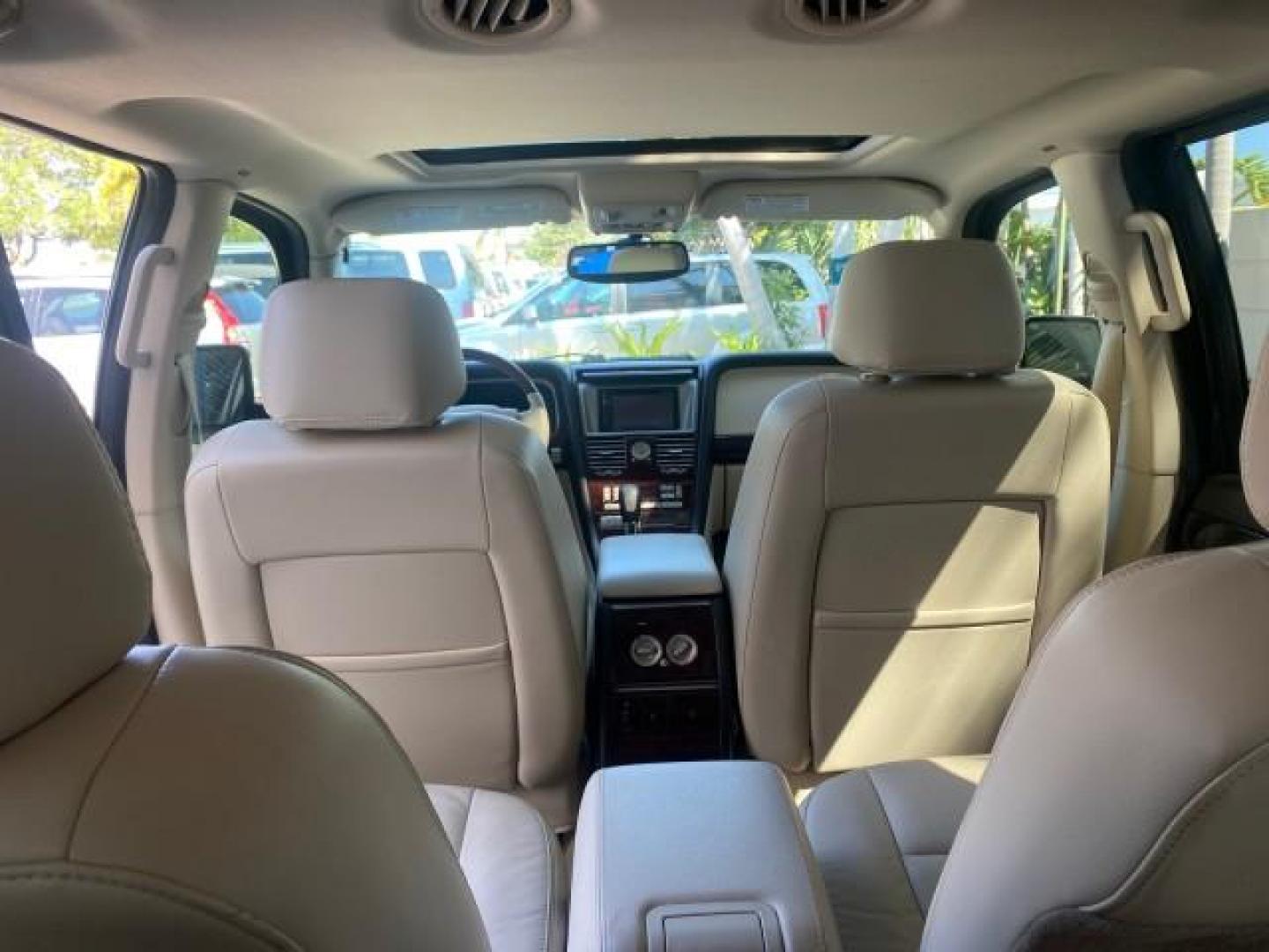 2003 Aspen Green Metallic /Light Parchment Lincoln Aviator Premium SUNROOF LEATHER NAV (5LMEU68H43Z) with an 4.6L DOHC 32-Valve V8 Engine engine, Automatic transmission, located at 4701 North Dixie Hwy, Pompano Beach, FL, 33064, (954) 422-2889, 26.240938, -80.123474 - OUR WEBPAGE FLORIDACARS1.COM HAS OVER 100 PHOTOS AND FREE CARFAX LINK 2003 LINCOLN AVIATOR PREMIUM NAV VIN: 5LMEU68H43ZJ52878 5 L M E U 6 8 H 4 3 Z J 5 2 8 7 8 4 DOOR WAGON/SPORT UTILITY 4.6L V8 F DOHC GASOLINE REAR WHEEL DRIVE Top Features Alloy Wheels Rear View Camera Fold-Away Third Row Running B - Photo#69