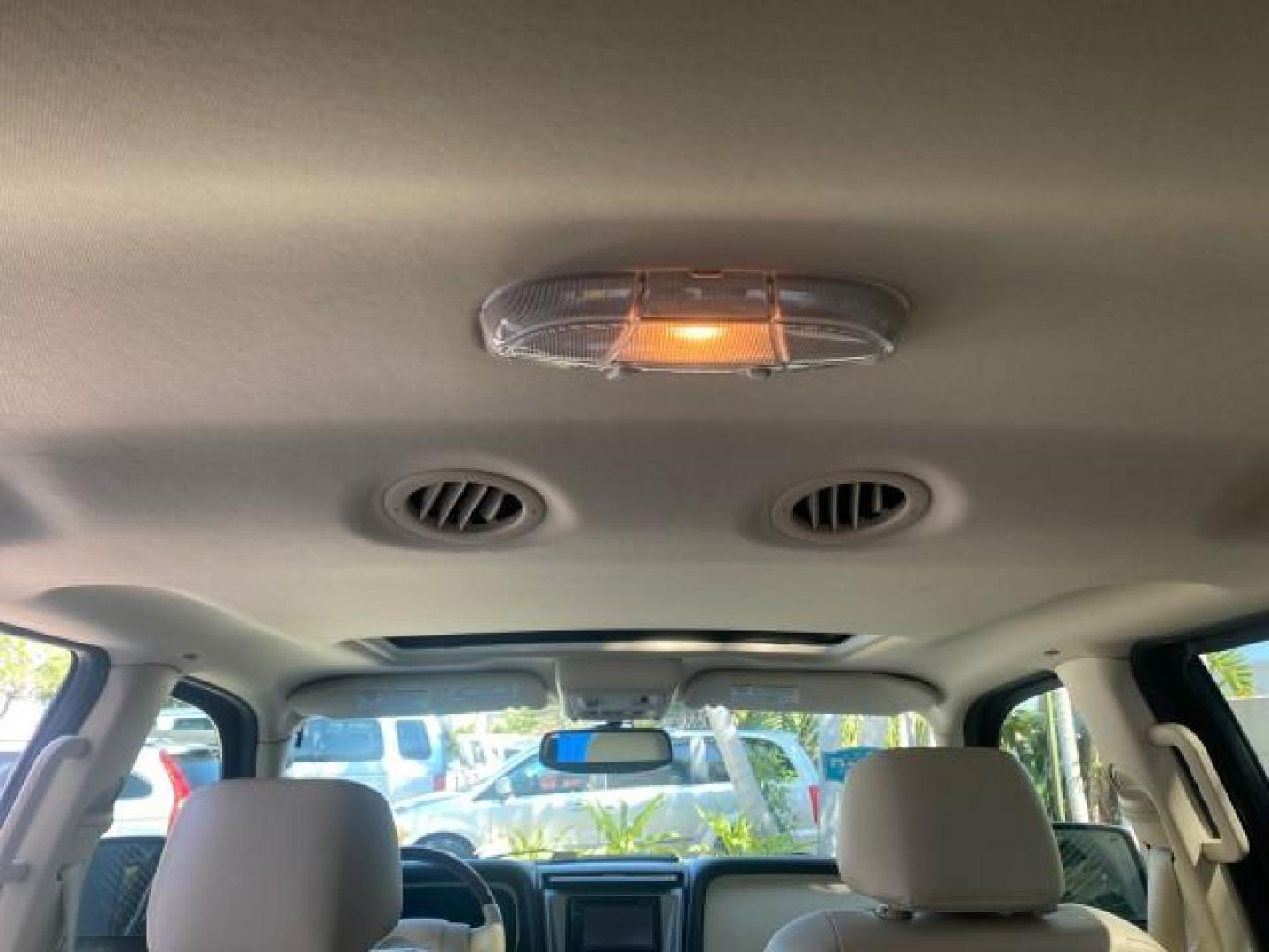 2003 Aspen Green Metallic /Light Parchment Lincoln Aviator Premium SUNROOF LEATHER NAV (5LMEU68H43Z) with an 4.6L DOHC 32-Valve V8 Engine engine, Automatic transmission, located at 4701 North Dixie Hwy, Pompano Beach, FL, 33064, (954) 422-2889, 26.240938, -80.123474 - OUR WEBPAGE FLORIDACARS1.COM HAS OVER 100 PHOTOS AND FREE CARFAX LINK 2003 LINCOLN AVIATOR PREMIUM NAV VIN: 5LMEU68H43ZJ52878 5 L M E U 6 8 H 4 3 Z J 5 2 8 7 8 4 DOOR WAGON/SPORT UTILITY 4.6L V8 F DOHC GASOLINE REAR WHEEL DRIVE Top Features Alloy Wheels Rear View Camera Fold-Away Third Row Running B - Photo#71