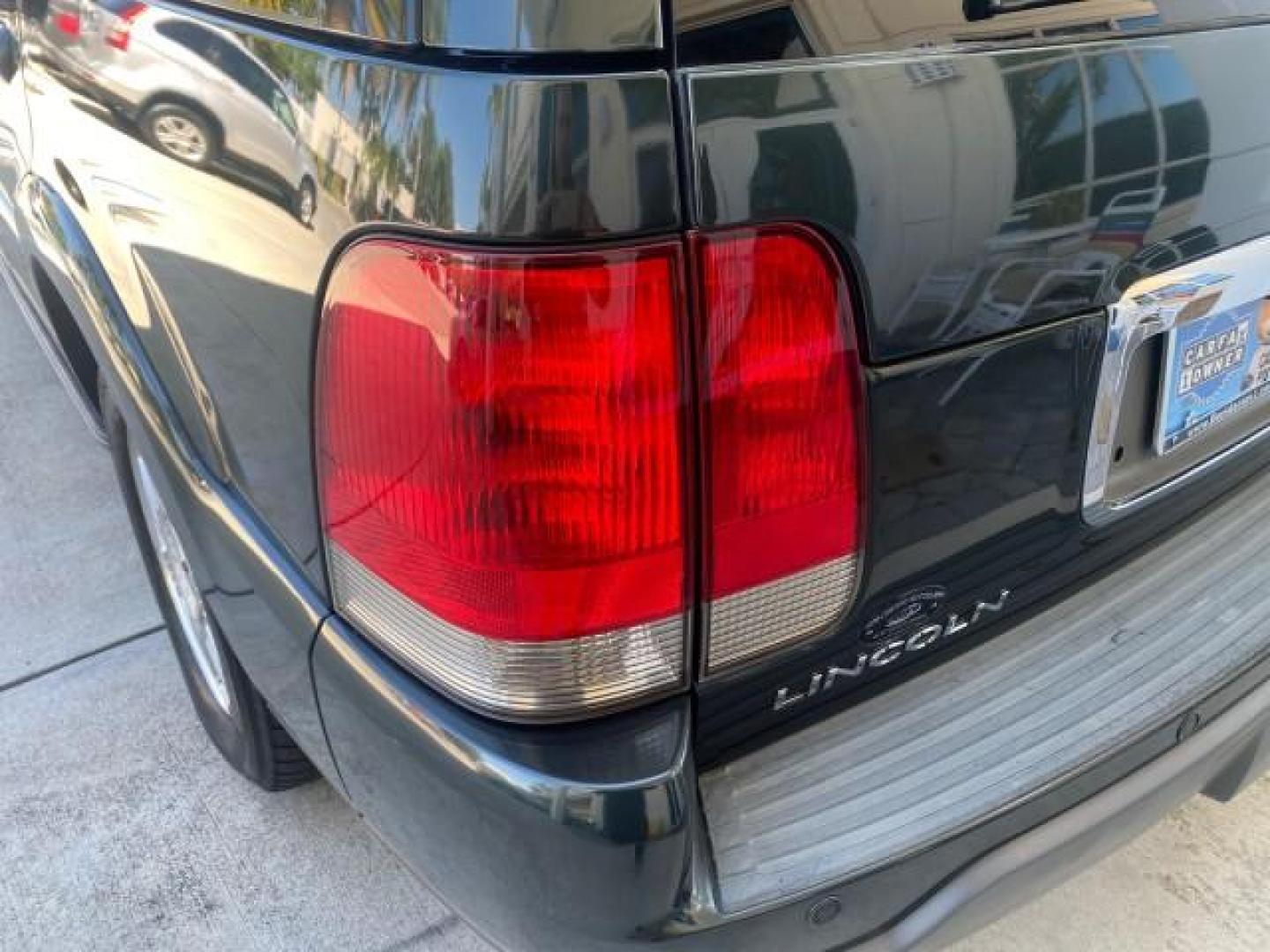 2003 Aspen Green Metallic /Light Parchment Lincoln Aviator Premium SUNROOF LEATHER NAV (5LMEU68H43Z) with an 4.6L DOHC 32-Valve V8 Engine engine, Automatic transmission, located at 4701 North Dixie Hwy, Pompano Beach, FL, 33064, (954) 422-2889, 26.240938, -80.123474 - OUR WEBPAGE FLORIDACARS1.COM HAS OVER 100 PHOTOS AND FREE CARFAX LINK 2003 LINCOLN AVIATOR PREMIUM NAV VIN: 5LMEU68H43ZJ52878 5 L M E U 6 8 H 4 3 Z J 5 2 8 7 8 4 DOOR WAGON/SPORT UTILITY 4.6L V8 F DOHC GASOLINE REAR WHEEL DRIVE Top Features Alloy Wheels Rear View Camera Fold-Away Third Row Running B - Photo#75