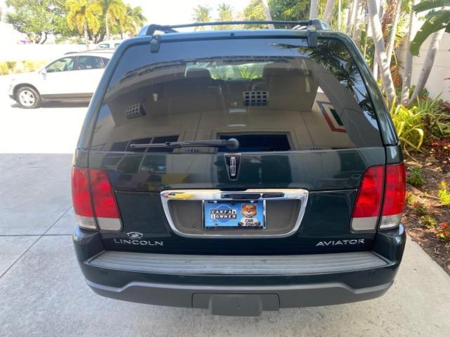 2003 Aspen Green Metallic /Light Parchment Lincoln Aviator Premium SUNROOF LEATHER NAV (5LMEU68H43Z) with an 4.6L DOHC 32-Valve V8 Engine engine, Automatic transmission, located at 4701 North Dixie Hwy, Pompano Beach, FL, 33064, (954) 422-2889, 26.240938, -80.123474 - OUR WEBPAGE FLORIDACARS1.COM HAS OVER 100 PHOTOS AND FREE CARFAX LINK 2003 LINCOLN AVIATOR PREMIUM NAV VIN: 5LMEU68H43ZJ52878 5 L M E U 6 8 H 4 3 Z J 5 2 8 7 8 4 DOOR WAGON/SPORT UTILITY 4.6L V8 F DOHC GASOLINE REAR WHEEL DRIVE Top Features Alloy Wheels Rear View Camera Fold-Away Third Row Running B - Photo#76
