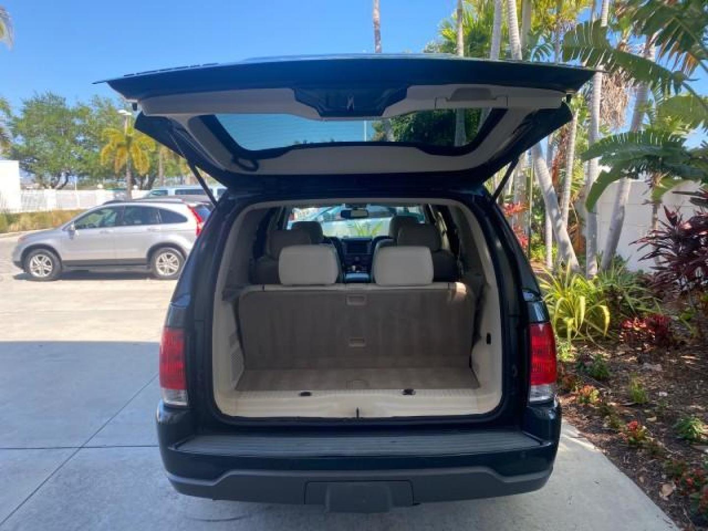 2003 Aspen Green Metallic /Light Parchment Lincoln Aviator Premium SUNROOF LEATHER NAV (5LMEU68H43Z) with an 4.6L DOHC 32-Valve V8 Engine engine, Automatic transmission, located at 4701 North Dixie Hwy, Pompano Beach, FL, 33064, (954) 422-2889, 26.240938, -80.123474 - OUR WEBPAGE FLORIDACARS1.COM HAS OVER 100 PHOTOS AND FREE CARFAX LINK 2003 LINCOLN AVIATOR PREMIUM NAV VIN: 5LMEU68H43ZJ52878 5 L M E U 6 8 H 4 3 Z J 5 2 8 7 8 4 DOOR WAGON/SPORT UTILITY 4.6L V8 F DOHC GASOLINE REAR WHEEL DRIVE Top Features Alloy Wheels Rear View Camera Fold-Away Third Row Running B - Photo#78