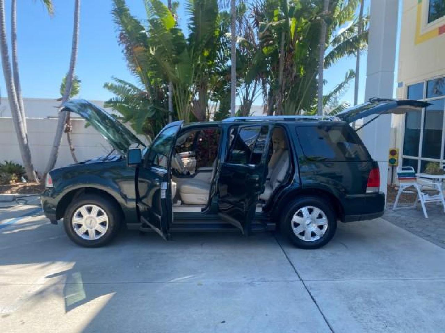 2003 Aspen Green Metallic /Light Parchment Lincoln Aviator Premium SUNROOF LEATHER NAV (5LMEU68H43Z) with an 4.6L DOHC 32-Valve V8 Engine engine, Automatic transmission, located at 4701 North Dixie Hwy, Pompano Beach, FL, 33064, (954) 422-2889, 26.240938, -80.123474 - OUR WEBPAGE FLORIDACARS1.COM HAS OVER 100 PHOTOS AND FREE CARFAX LINK 2003 LINCOLN AVIATOR PREMIUM NAV VIN: 5LMEU68H43ZJ52878 5 L M E U 6 8 H 4 3 Z J 5 2 8 7 8 4 DOOR WAGON/SPORT UTILITY 4.6L V8 F DOHC GASOLINE REAR WHEEL DRIVE Top Features Alloy Wheels Rear View Camera Fold-Away Third Row Running B - Photo#8