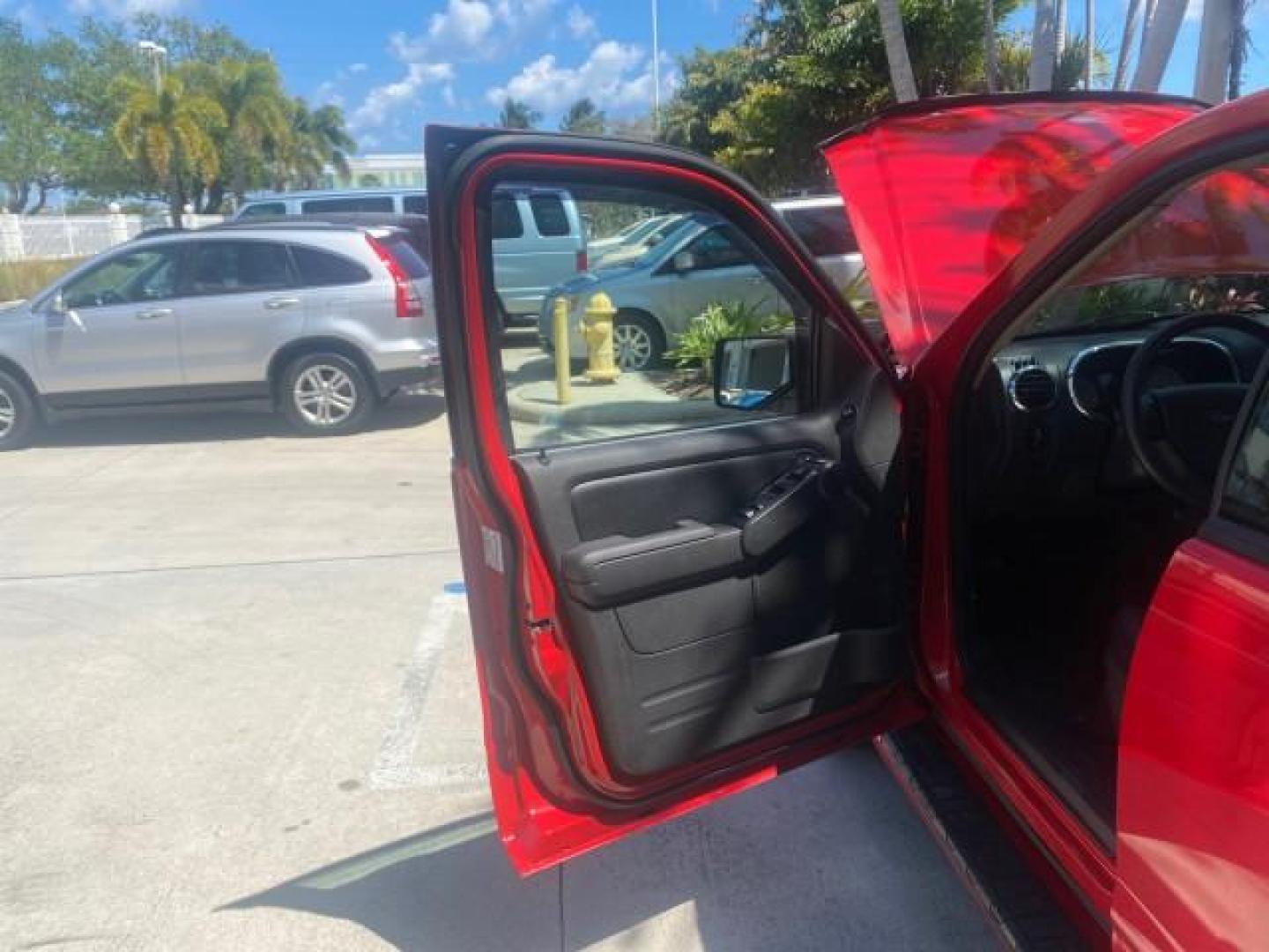 2008 Colorado Red /Charcoal Ford Explorer Sport Trac Adrenaline LOW MILES 68,774 AWD (1FMEU23E08U) with an 4.0L SOHC 12-Valve V6 Engine engine, Automatic transmission, located at 4701 North Dixie Hwy, Pompano Beach, FL, 33064, (954) 422-2889, 26.240938, -80.123474 - OUR WEBPAGE FLORIDACARS1.COM HAS OVER 100 PHOTOS AND FREE CARFAX LINK 2008 FORD EXPLORER SPORT TRAC LIMITED ADRENALIN PKG $ 35,930 NEW VIN: 1FMEU23E08UB26856 1 F M E U 2 3 E 0 8 U B 2 6 8 5 6 SPORT PICKUP 4.0L V6 F SOHC GASOLINE ALL WHEEL DRIVE Top Features 20 Inch Plus Wheels Leather Seats 4WD/AWD - Photo#9
