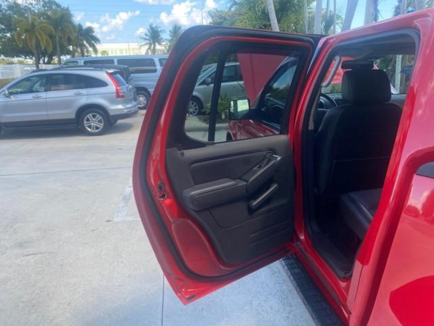 2008 Colorado Red /Charcoal Ford Explorer Sport Trac Adrenaline LOW MILES 68,774 AWD (1FMEU23E08U) with an 4.0L SOHC 12-Valve V6 Engine engine, Automatic transmission, located at 4701 North Dixie Hwy, Pompano Beach, FL, 33064, (954) 422-2889, 26.240938, -80.123474 - OUR WEBPAGE FLORIDACARS1.COM HAS OVER 100 PHOTOS AND FREE CARFAX LINK 2008 FORD EXPLORER SPORT TRAC LIMITED ADRENALIN PKG $ 35,930 NEW VIN: 1FMEU23E08UB26856 1 F M E U 2 3 E 0 8 U B 2 6 8 5 6 SPORT PICKUP 4.0L V6 F SOHC GASOLINE ALL WHEEL DRIVE Top Features 20 Inch Plus Wheels Leather Seats 4WD/AWD - Photo#13