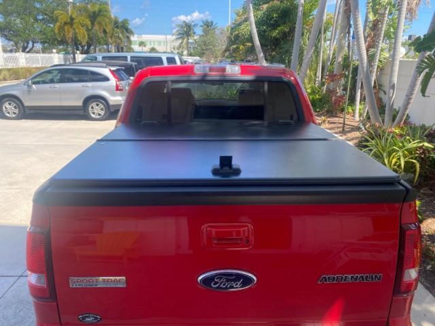 2008 Colorado Red /Charcoal Ford Explorer Sport Trac Adrenaline LOW MILES 68,774 AWD (1FMEU23E08U) with an 4.0L SOHC 12-Valve V6 Engine engine, Automatic transmission, located at 4701 North Dixie Hwy, Pompano Beach, FL, 33064, (954) 422-2889, 26.240938, -80.123474 - OUR WEBPAGE FLORIDACARS1.COM HAS OVER 100 PHOTOS AND FREE CARFAX LINK 2008 FORD EXPLORER SPORT TRAC LIMITED ADRENALIN PKG $ 35,930 NEW VIN: 1FMEU23E08UB26856 1 F M E U 2 3 E 0 8 U B 2 6 8 5 6 SPORT PICKUP 4.0L V6 F SOHC GASOLINE ALL WHEEL DRIVE Top Features 20 Inch Plus Wheels Leather Seats 4WD/AWD - Photo#75