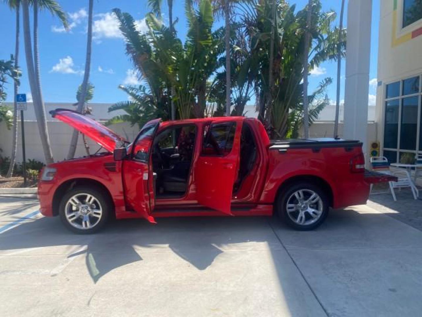 2008 Colorado Red /Charcoal Ford Explorer Sport Trac Adrenaline LOW MILES 68,774 AWD (1FMEU23E08U) with an 4.0L SOHC 12-Valve V6 Engine engine, Automatic transmission, located at 4701 North Dixie Hwy, Pompano Beach, FL, 33064, (954) 422-2889, 26.240938, -80.123474 - OUR WEBPAGE FLORIDACARS1.COM HAS OVER 100 PHOTOS AND FREE CARFAX LINK 2008 FORD EXPLORER SPORT TRAC LIMITED ADRENALIN PKG $ 35,930 NEW VIN: 1FMEU23E08UB26856 1 F M E U 2 3 E 0 8 U B 2 6 8 5 6 SPORT PICKUP 4.0L V6 F SOHC GASOLINE ALL WHEEL DRIVE Top Features 20 Inch Plus Wheels Leather Seats 4WD/AWD - Photo#8