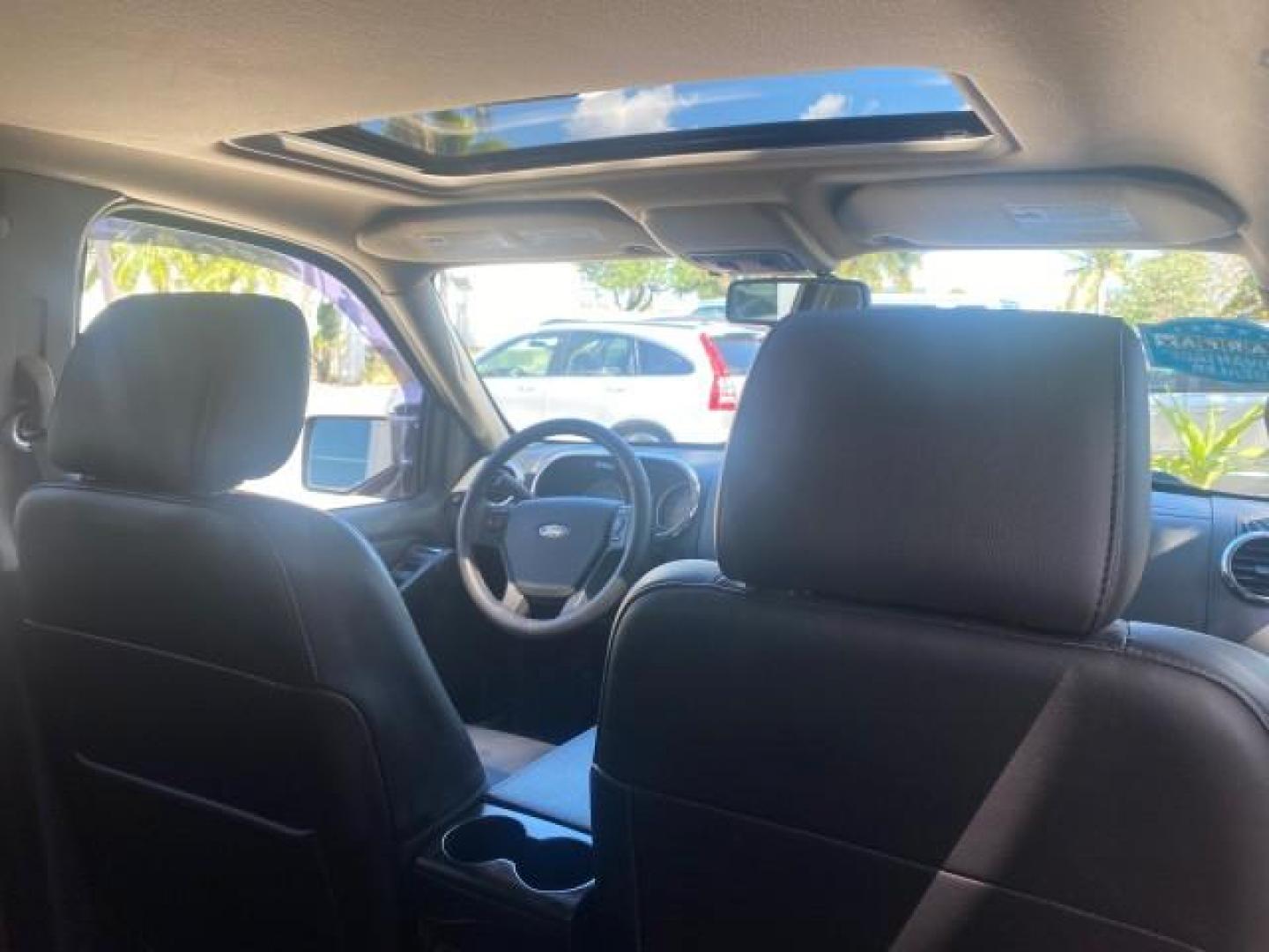 2008 Colorado Red /Charcoal Ford Explorer Sport Trac Adrenaline LOW MILES 68,774 AWD (1FMEU23E08U) with an 4.0L SOHC 12-Valve V6 Engine engine, Automatic transmission, located at 4701 North Dixie Hwy, Pompano Beach, FL, 33064, (954) 422-2889, 26.240938, -80.123474 - OUR WEBPAGE FLORIDACARS1.COM HAS OVER 100 PHOTOS AND FREE CARFAX LINK 2008 FORD EXPLORER SPORT TRAC LIMITED ADRENALIN PKG $ 35,930 NEW VIN: 1FMEU23E08UB26856 1 F M E U 2 3 E 0 8 U B 2 6 8 5 6 SPORT PICKUP 4.0L V6 F SOHC GASOLINE ALL WHEEL DRIVE Top Features 20 Inch Plus Wheels Leather Seats 4WD/AWD - Photo#91