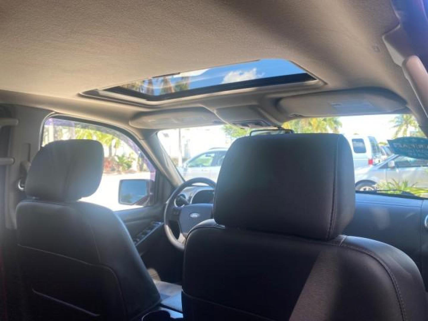 2008 Colorado Red /Charcoal Ford Explorer Sport Trac Adrenaline LOW MILES 68,774 AWD (1FMEU23E08U) with an 4.0L SOHC 12-Valve V6 Engine engine, Automatic transmission, located at 4701 North Dixie Hwy, Pompano Beach, FL, 33064, (954) 422-2889, 26.240938, -80.123474 - OUR WEBPAGE FLORIDACARS1.COM HAS OVER 100 PHOTOS AND FREE CARFAX LINK 2008 FORD EXPLORER SPORT TRAC LIMITED ADRENALIN PKG $ 35,930 NEW VIN: 1FMEU23E08UB26856 1 F M E U 2 3 E 0 8 U B 2 6 8 5 6 SPORT PICKUP 4.0L V6 F SOHC GASOLINE ALL WHEEL DRIVE Top Features 20 Inch Plus Wheels Leather Seats 4WD/AWD - Photo#93
