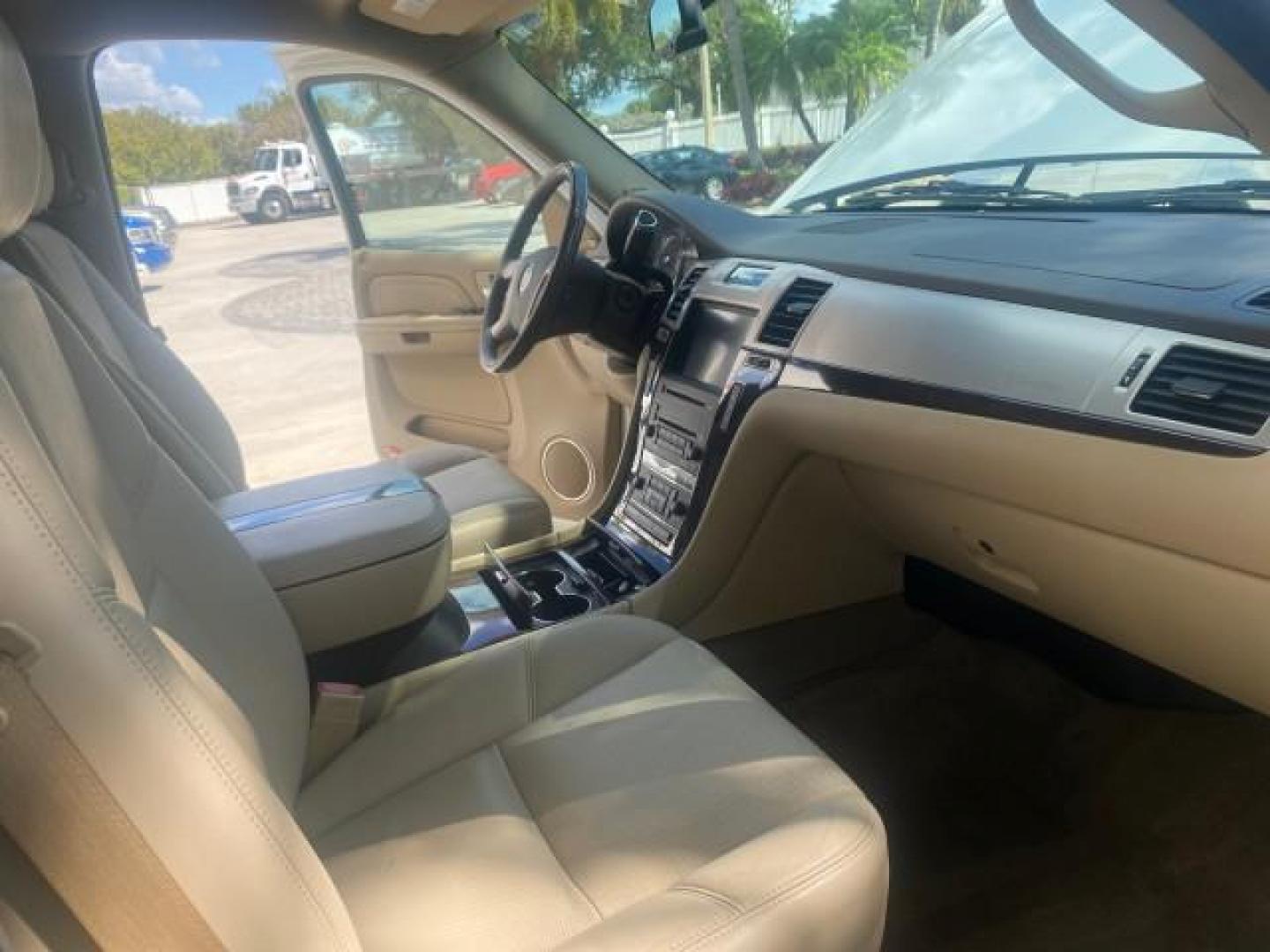 2009 White Diamond Tricoat /Cashmere/Cocoa Cadillac Escalade LOW MILES 77,086 WHITE DIAMOND (1GYFC13279R) with an 6.2L Vortec 1000 V8 SFI E85 Engine engine, Automatic transmission, located at 4701 North Dixie Hwy, Pompano Beach, FL, 33064, (954) 422-2889, 26.240938, -80.123474 - OUR WEBPAGE FLORIDACARS1.COM HAS OVER 100 PHOTOS AND FREE CARFAX LINK 2009 CADILLAC ESCALADE NAV VIN: 1GYFC13279R235017 1 G Y F C 1 3 2 7 9 R 2 3 5 0 1 7 4 DOOR WAGON/SPORT UTILITY 6.2L V8 F OHV 16V TOW PKG FLEX FUEL NO RECALLS REAR WHEEL DRIVE Top Features Alloy Wheels Quad Seats BOSE Sound System - Photo#12