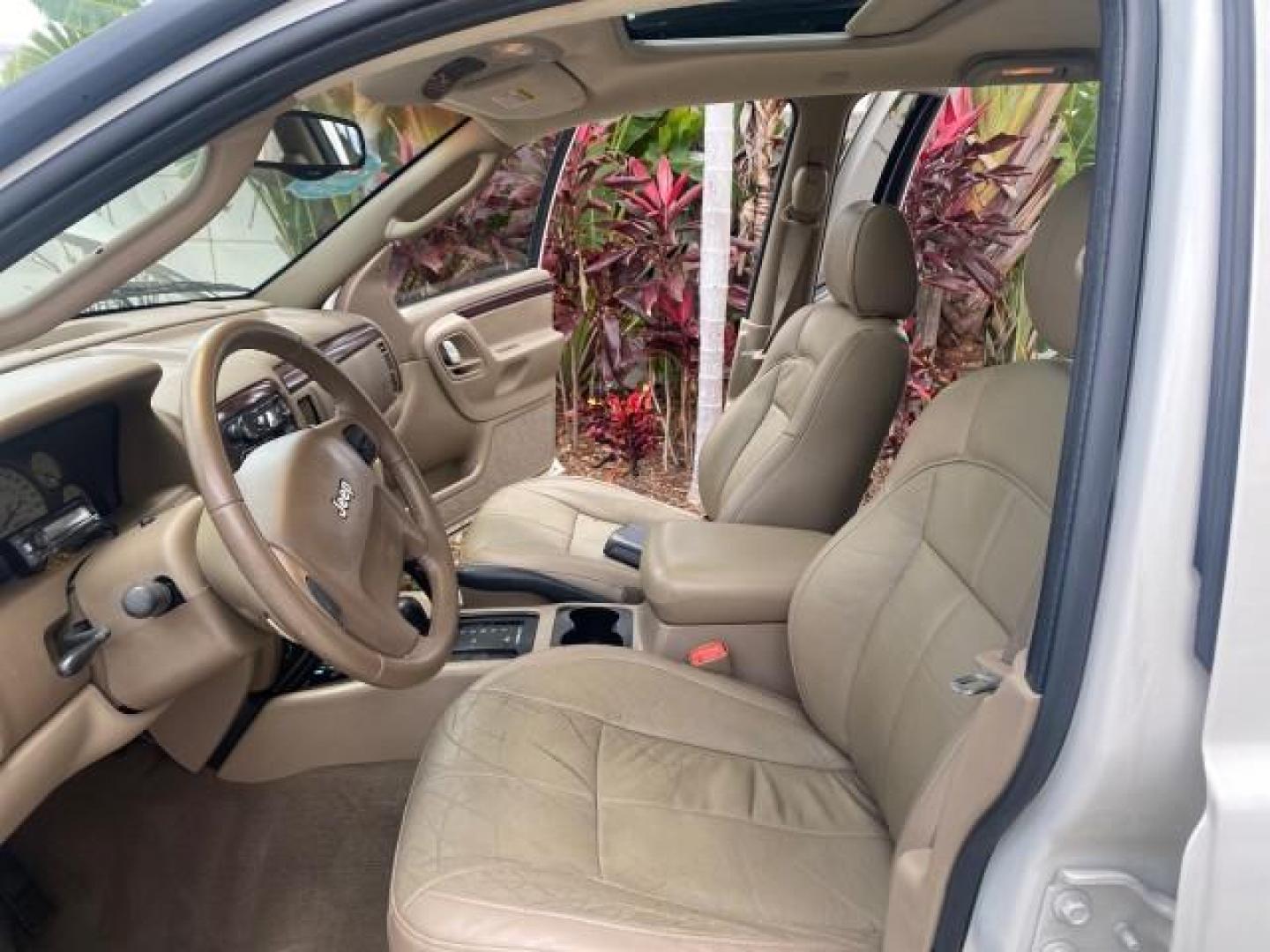 2004 Stone White /Sandstone Jeep Grand Cherokee Limited 4WD SUNROOF (1J8GW58N14C) with an 4.7L 8-Cyl Engine engine, Automatic transmission, located at 4701 North Dixie Hwy, Pompano Beach, FL, 33064, (954) 422-2889, 26.240938, -80.123474 - OUR WEBPAGE FLORIDACARS1.COM HAS OVER 100 PHOTOS AND FREE CARFAX LINK 2004 JEEP GRAND CHEROKEE LIMITED A TRUE CLASSIC WONT LAST IN STOCK VIN: 1J8GW58N14C199129 1 J 8 G W 5 8 N 1 4 C 1 9 9 1 2 9 4 DOOR WAGON/SPORT UTILITY 4.7L V8 F SOHC TOW PKG AND FRONT TOW HITCH WITH PLUG GASOLINE REAR WHEEL DRIVE - Photo#10