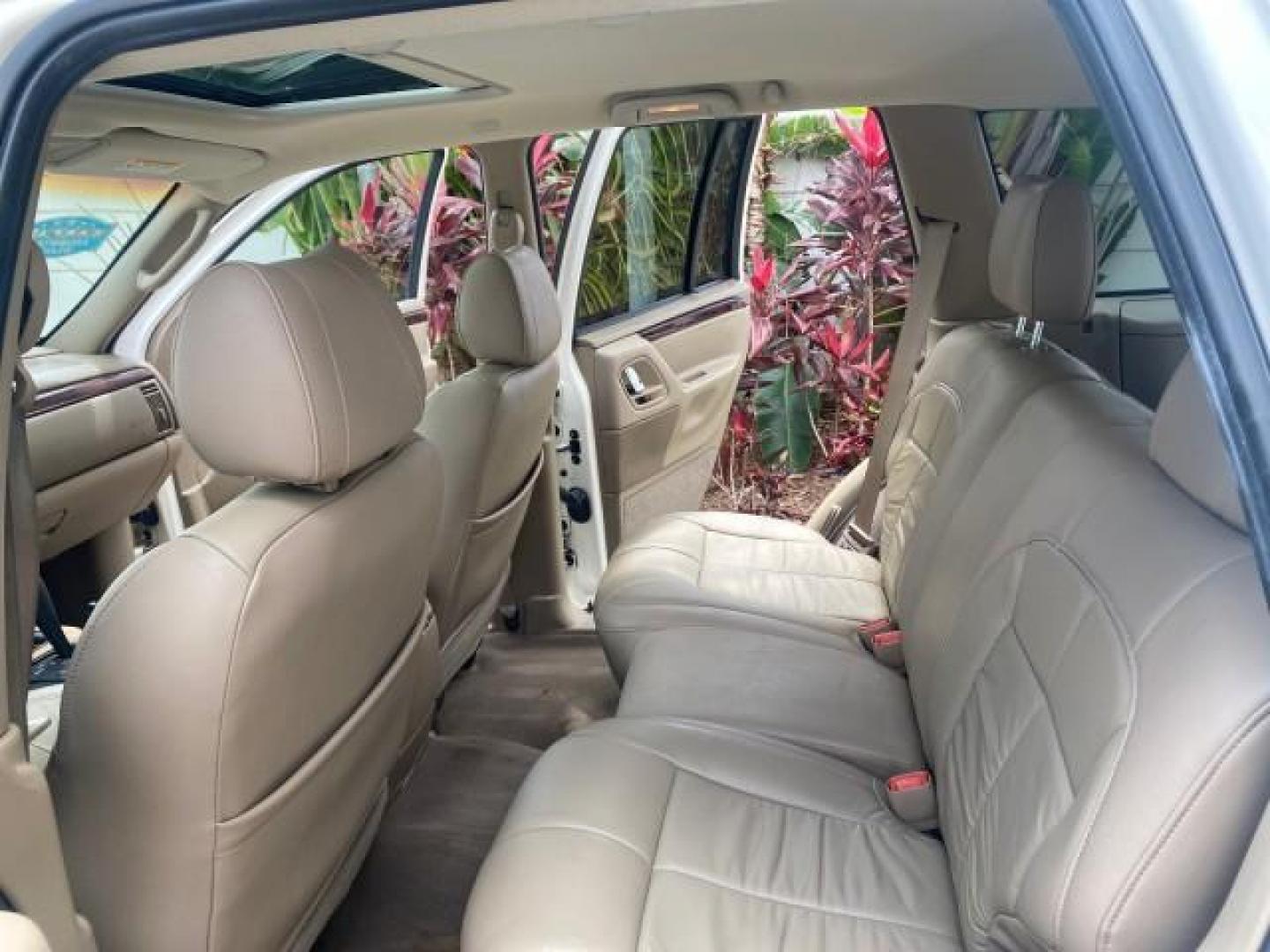 2004 Stone White /Sandstone Jeep Grand Cherokee Limited 4WD SUNROOF (1J8GW58N14C) with an 4.7L 8-Cyl Engine engine, Automatic transmission, located at 4701 North Dixie Hwy, Pompano Beach, FL, 33064, (954) 422-2889, 26.240938, -80.123474 - OUR WEBPAGE FLORIDACARS1.COM HAS OVER 100 PHOTOS AND FREE CARFAX LINK 2004 JEEP GRAND CHEROKEE LIMITED A TRUE CLASSIC WONT LAST IN STOCK VIN: 1J8GW58N14C199129 1 J 8 G W 5 8 N 1 4 C 1 9 9 1 2 9 4 DOOR WAGON/SPORT UTILITY 4.7L V8 F SOHC TOW PKG AND FRONT TOW HITCH WITH PLUG GASOLINE REAR WHEEL DRIVE - Photo#14