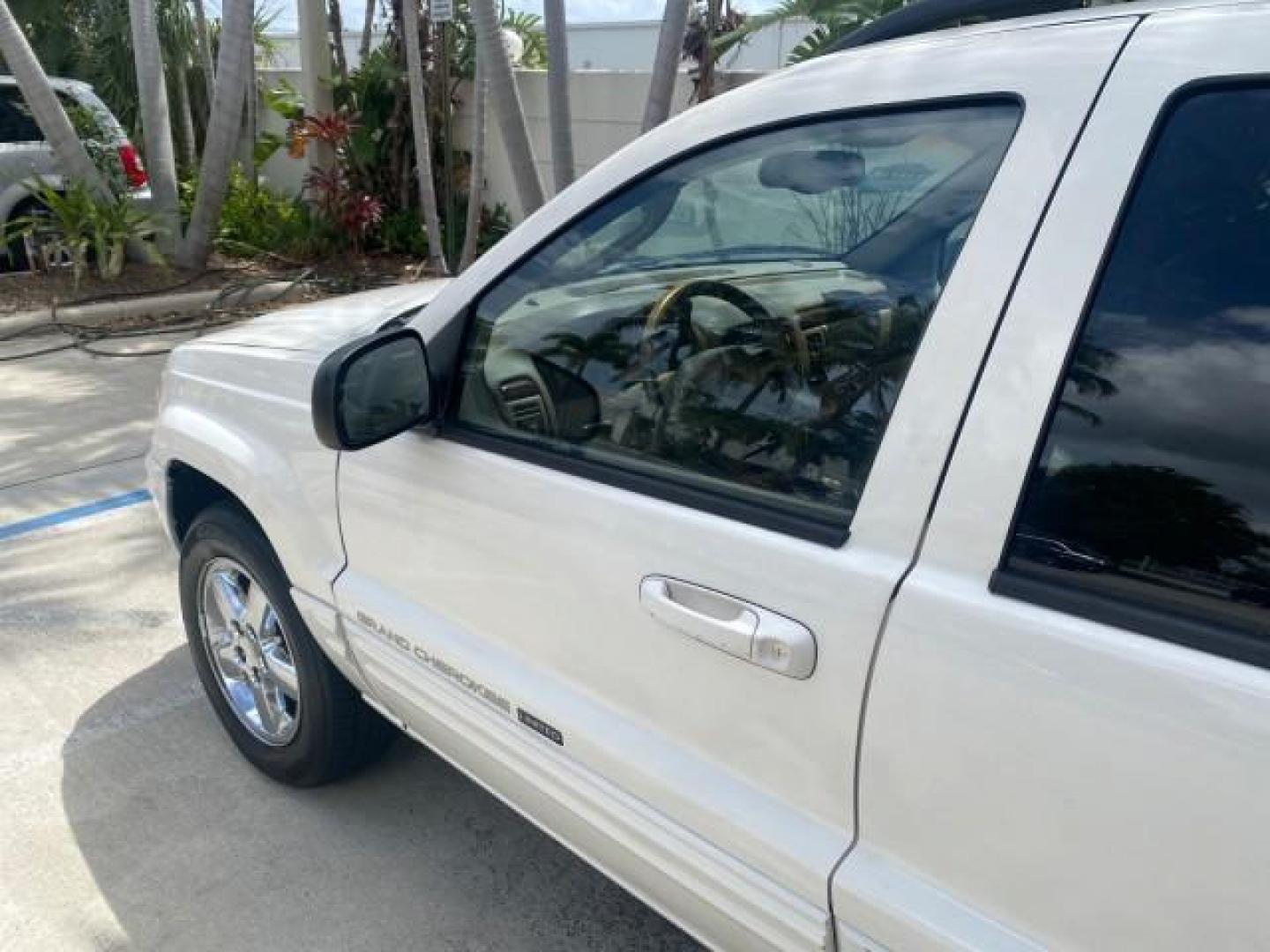 2004 Stone White /Sandstone Jeep Grand Cherokee Limited 4WD SUNROOF (1J8GW58N14C) with an 4.7L 8-Cyl Engine engine, Automatic transmission, located at 4701 North Dixie Hwy, Pompano Beach, FL, 33064, (954) 422-2889, 26.240938, -80.123474 - OUR WEBPAGE FLORIDACARS1.COM HAS OVER 100 PHOTOS AND FREE CARFAX LINK 2004 JEEP GRAND CHEROKEE LIMITED A TRUE CLASSIC WONT LAST IN STOCK VIN: 1J8GW58N14C199129 1 J 8 G W 5 8 N 1 4 C 1 9 9 1 2 9 4 DOOR WAGON/SPORT UTILITY 4.7L V8 F SOHC TOW PKG AND FRONT TOW HITCH WITH PLUG GASOLINE REAR WHEEL DRIVE - Photo#26