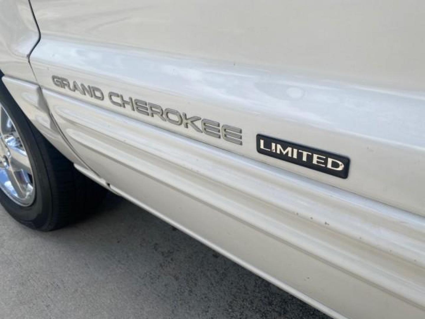 2004 Stone White /Sandstone Jeep Grand Cherokee Limited 4WD SUNROOF (1J8GW58N14C) with an 4.7L 8-Cyl Engine engine, Automatic transmission, located at 4701 North Dixie Hwy, Pompano Beach, FL, 33064, (954) 422-2889, 26.240938, -80.123474 - OUR WEBPAGE FLORIDACARS1.COM HAS OVER 100 PHOTOS AND FREE CARFAX LINK 2004 JEEP GRAND CHEROKEE LIMITED A TRUE CLASSIC WONT LAST IN STOCK VIN: 1J8GW58N14C199129 1 J 8 G W 5 8 N 1 4 C 1 9 9 1 2 9 4 DOOR WAGON/SPORT UTILITY 4.7L V8 F SOHC TOW PKG AND FRONT TOW HITCH WITH PLUG GASOLINE REAR WHEEL DRIVE - Photo#30