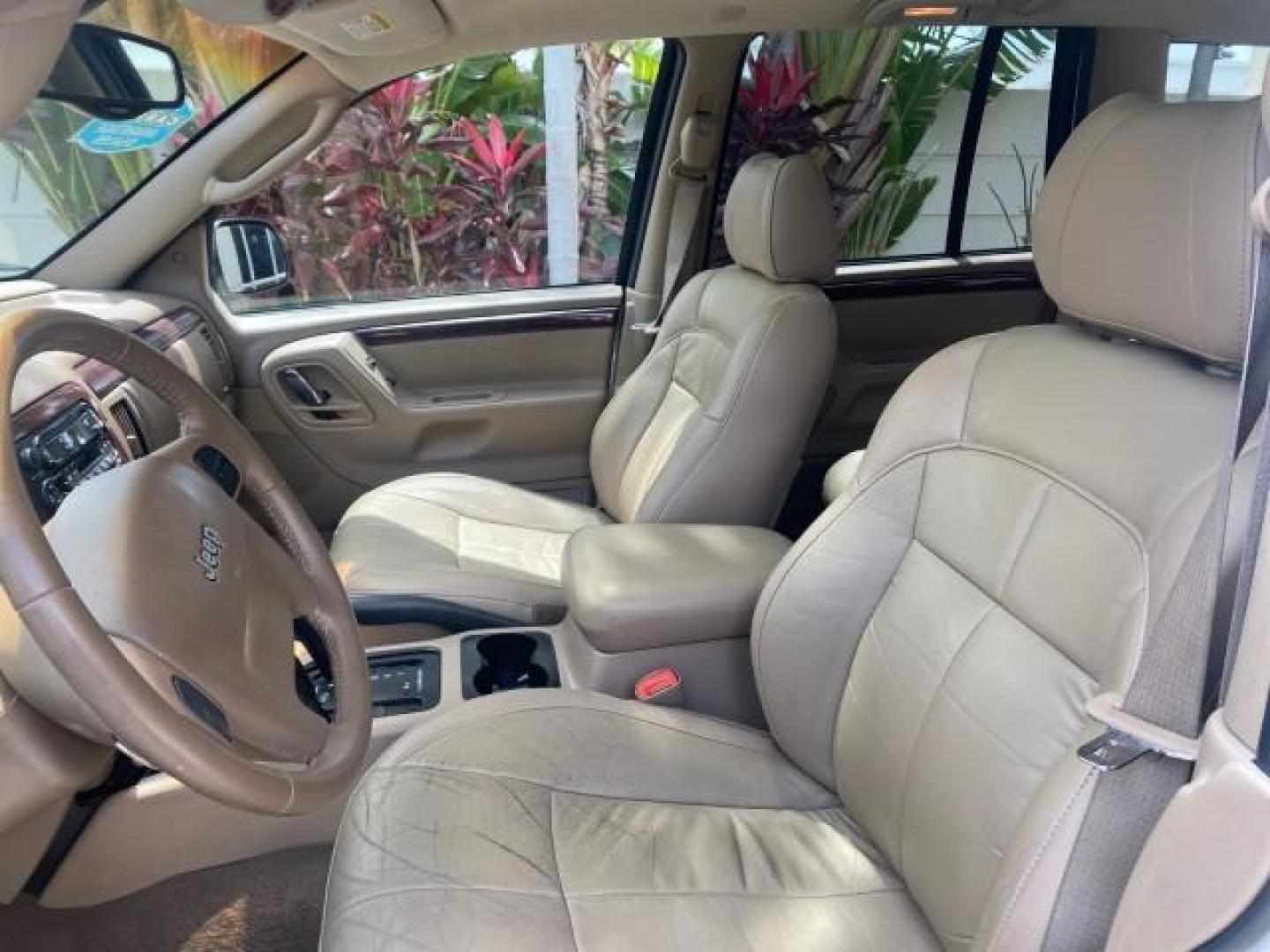 2004 Stone White /Sandstone Jeep Grand Cherokee Limited 4WD SUNROOF (1J8GW58N14C) with an 4.7L 8-Cyl Engine engine, Automatic transmission, located at 4701 North Dixie Hwy, Pompano Beach, FL, 33064, (954) 422-2889, 26.240938, -80.123474 - OUR WEBPAGE FLORIDACARS1.COM HAS OVER 100 PHOTOS AND FREE CARFAX LINK 2004 JEEP GRAND CHEROKEE LIMITED A TRUE CLASSIC WONT LAST IN STOCK VIN: 1J8GW58N14C199129 1 J 8 G W 5 8 N 1 4 C 1 9 9 1 2 9 4 DOOR WAGON/SPORT UTILITY 4.7L V8 F SOHC TOW PKG AND FRONT TOW HITCH WITH PLUG GASOLINE REAR WHEEL DRIVE - Photo#33