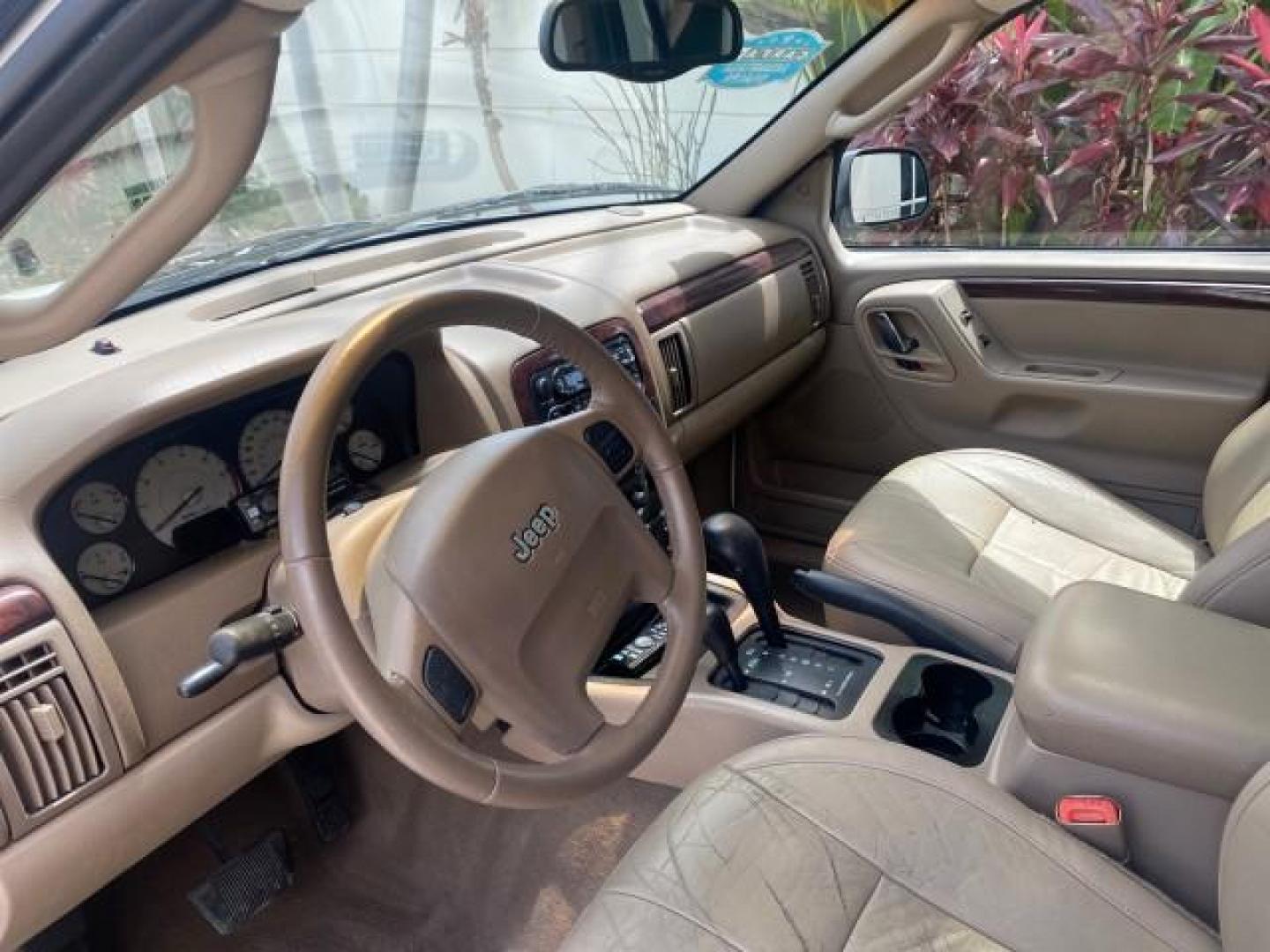 2004 Stone White /Sandstone Jeep Grand Cherokee Limited 4WD SUNROOF (1J8GW58N14C) with an 4.7L 8-Cyl Engine engine, Automatic transmission, located at 4701 North Dixie Hwy, Pompano Beach, FL, 33064, (954) 422-2889, 26.240938, -80.123474 - OUR WEBPAGE FLORIDACARS1.COM HAS OVER 100 PHOTOS AND FREE CARFAX LINK 2004 JEEP GRAND CHEROKEE LIMITED A TRUE CLASSIC WONT LAST IN STOCK VIN: 1J8GW58N14C199129 1 J 8 G W 5 8 N 1 4 C 1 9 9 1 2 9 4 DOOR WAGON/SPORT UTILITY 4.7L V8 F SOHC TOW PKG AND FRONT TOW HITCH WITH PLUG GASOLINE REAR WHEEL DRIVE - Photo#34