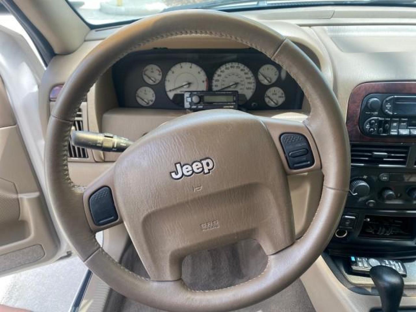 2004 Stone White /Sandstone Jeep Grand Cherokee Limited 4WD SUNROOF (1J8GW58N14C) with an 4.7L 8-Cyl Engine engine, Automatic transmission, located at 4701 North Dixie Hwy, Pompano Beach, FL, 33064, (954) 422-2889, 26.240938, -80.123474 - OUR WEBPAGE FLORIDACARS1.COM HAS OVER 100 PHOTOS AND FREE CARFAX LINK 2004 JEEP GRAND CHEROKEE LIMITED A TRUE CLASSIC WONT LAST IN STOCK VIN: 1J8GW58N14C199129 1 J 8 G W 5 8 N 1 4 C 1 9 9 1 2 9 4 DOOR WAGON/SPORT UTILITY 4.7L V8 F SOHC TOW PKG AND FRONT TOW HITCH WITH PLUG GASOLINE REAR WHEEL DRIVE - Photo#36