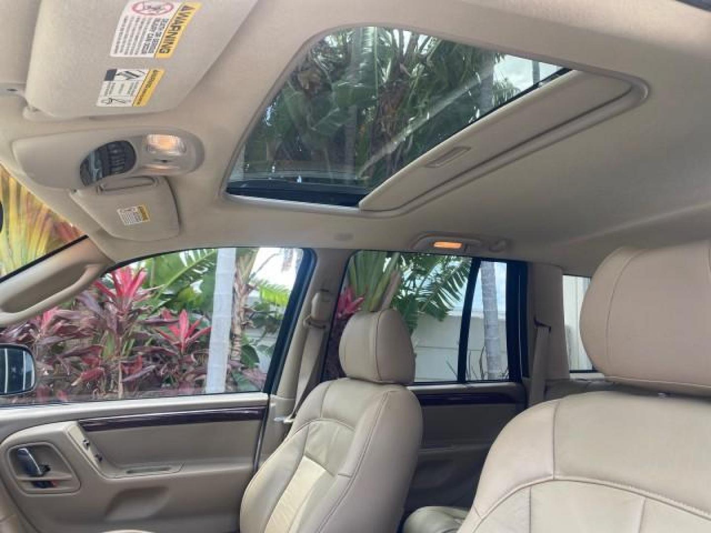 2004 Stone White /Sandstone Jeep Grand Cherokee Limited 4WD SUNROOF (1J8GW58N14C) with an 4.7L 8-Cyl Engine engine, Automatic transmission, located at 4701 North Dixie Hwy, Pompano Beach, FL, 33064, (954) 422-2889, 26.240938, -80.123474 - OUR WEBPAGE FLORIDACARS1.COM HAS OVER 100 PHOTOS AND FREE CARFAX LINK 2004 JEEP GRAND CHEROKEE LIMITED A TRUE CLASSIC WONT LAST IN STOCK VIN: 1J8GW58N14C199129 1 J 8 G W 5 8 N 1 4 C 1 9 9 1 2 9 4 DOOR WAGON/SPORT UTILITY 4.7L V8 F SOHC TOW PKG AND FRONT TOW HITCH WITH PLUG GASOLINE REAR WHEEL DRIVE - Photo#43