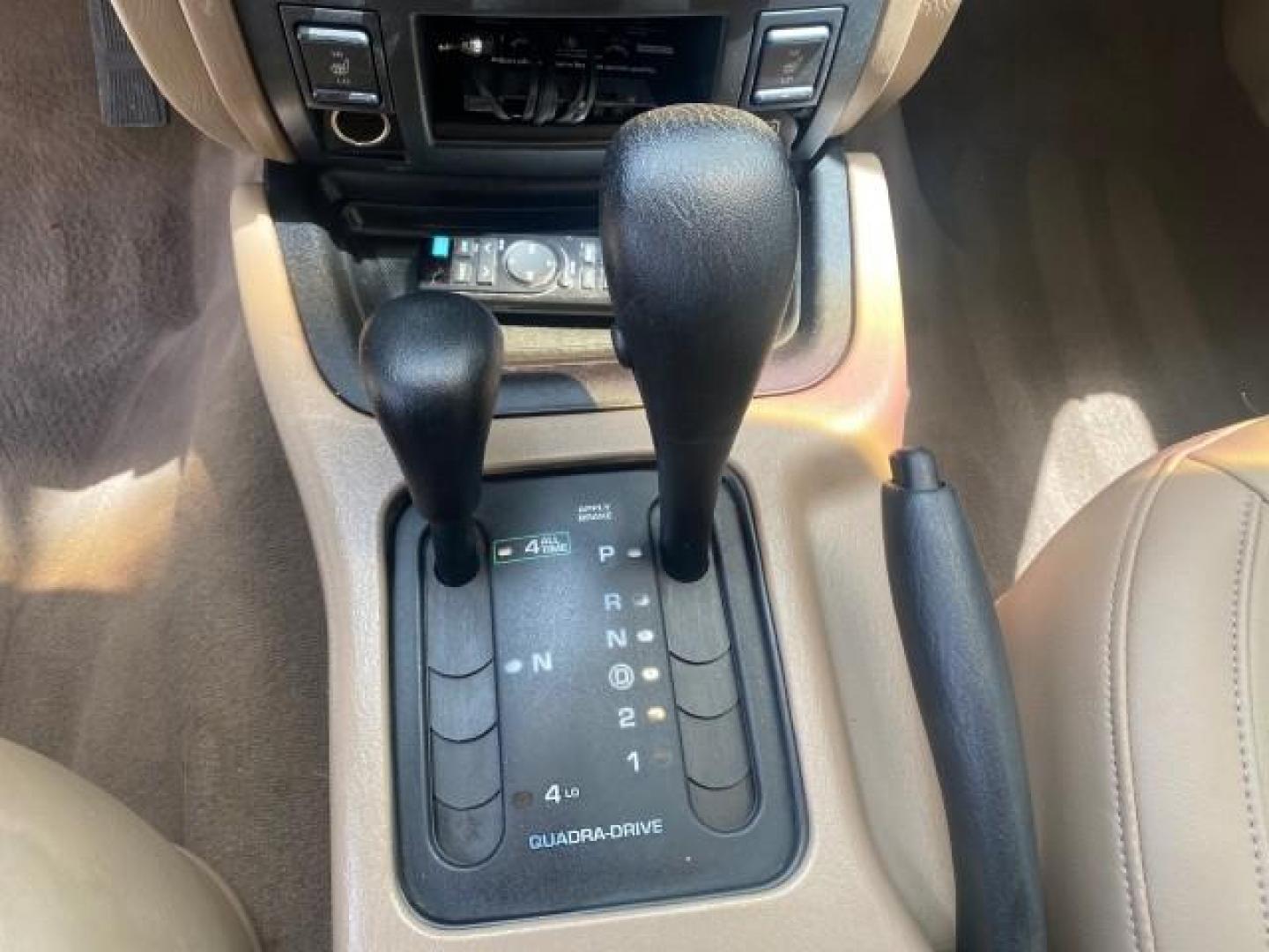 2004 Stone White /Sandstone Jeep Grand Cherokee Limited 4WD SUNROOF (1J8GW58N14C) with an 4.7L 8-Cyl Engine engine, Automatic transmission, located at 4701 North Dixie Hwy, Pompano Beach, FL, 33064, (954) 422-2889, 26.240938, -80.123474 - OUR WEBPAGE FLORIDACARS1.COM HAS OVER 100 PHOTOS AND FREE CARFAX LINK 2004 JEEP GRAND CHEROKEE LIMITED A TRUE CLASSIC WONT LAST IN STOCK VIN: 1J8GW58N14C199129 1 J 8 G W 5 8 N 1 4 C 1 9 9 1 2 9 4 DOOR WAGON/SPORT UTILITY 4.7L V8 F SOHC TOW PKG AND FRONT TOW HITCH WITH PLUG GASOLINE REAR WHEEL DRIVE - Photo#47