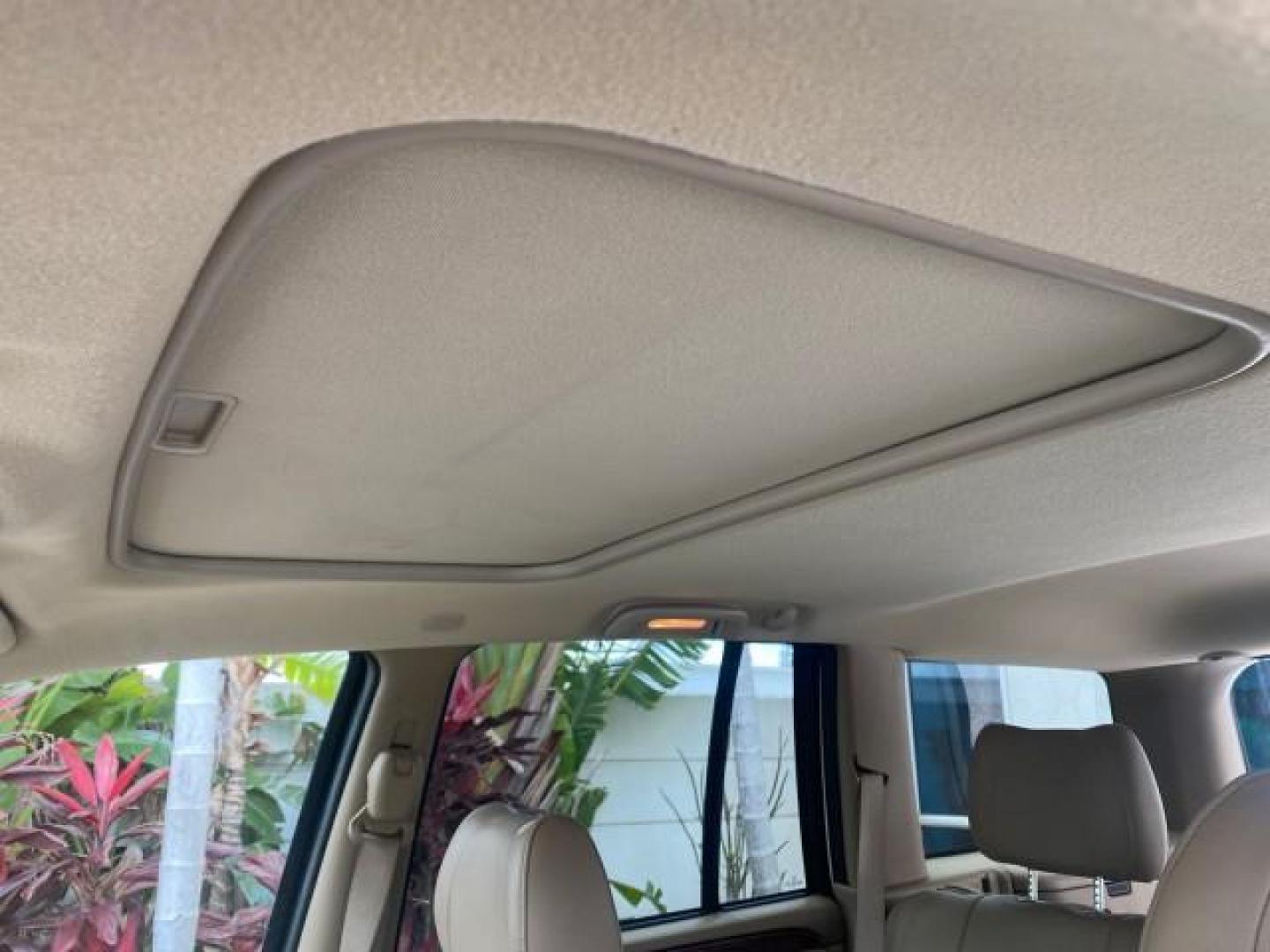 2004 Stone White /Sandstone Jeep Grand Cherokee Limited 4WD SUNROOF (1J8GW58N14C) with an 4.7L 8-Cyl Engine engine, Automatic transmission, located at 4701 North Dixie Hwy, Pompano Beach, FL, 33064, (954) 422-2889, 26.240938, -80.123474 - OUR WEBPAGE FLORIDACARS1.COM HAS OVER 100 PHOTOS AND FREE CARFAX LINK 2004 JEEP GRAND CHEROKEE LIMITED A TRUE CLASSIC WONT LAST IN STOCK VIN: 1J8GW58N14C199129 1 J 8 G W 5 8 N 1 4 C 1 9 9 1 2 9 4 DOOR WAGON/SPORT UTILITY 4.7L V8 F SOHC TOW PKG AND FRONT TOW HITCH WITH PLUG GASOLINE REAR WHEEL DRIVE - Photo#56