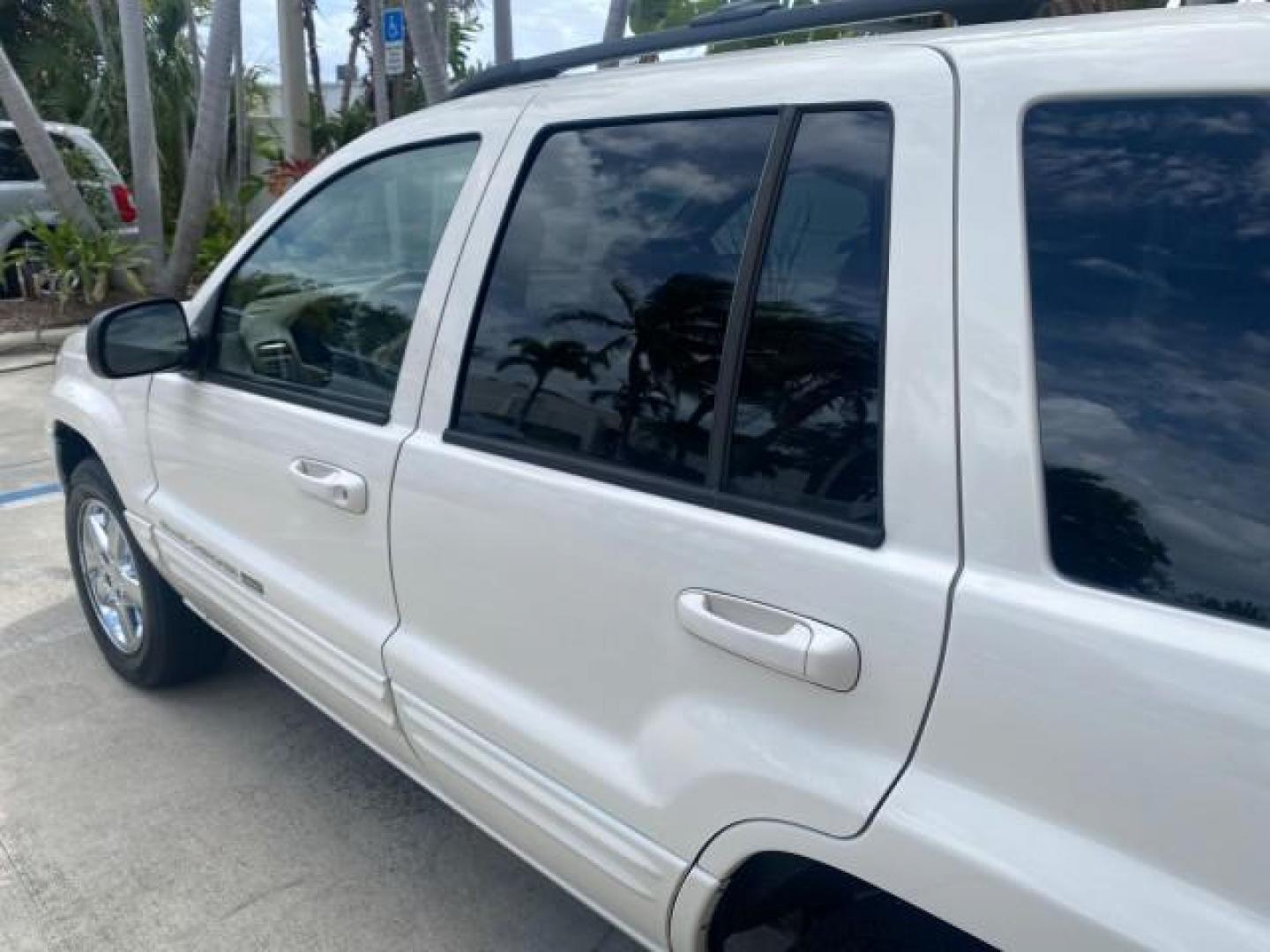 2004 Stone White /Sandstone Jeep Grand Cherokee Limited 4WD SUNROOF (1J8GW58N14C) with an 4.7L 8-Cyl Engine engine, Automatic transmission, located at 4701 North Dixie Hwy, Pompano Beach, FL, 33064, (954) 422-2889, 26.240938, -80.123474 - OUR WEBPAGE FLORIDACARS1.COM HAS OVER 100 PHOTOS AND FREE CARFAX LINK 2004 JEEP GRAND CHEROKEE LIMITED A TRUE CLASSIC WONT LAST IN STOCK VIN: 1J8GW58N14C199129 1 J 8 G W 5 8 N 1 4 C 1 9 9 1 2 9 4 DOOR WAGON/SPORT UTILITY 4.7L V8 F SOHC TOW PKG AND FRONT TOW HITCH WITH PLUG GASOLINE REAR WHEEL DRIVE - Photo#58