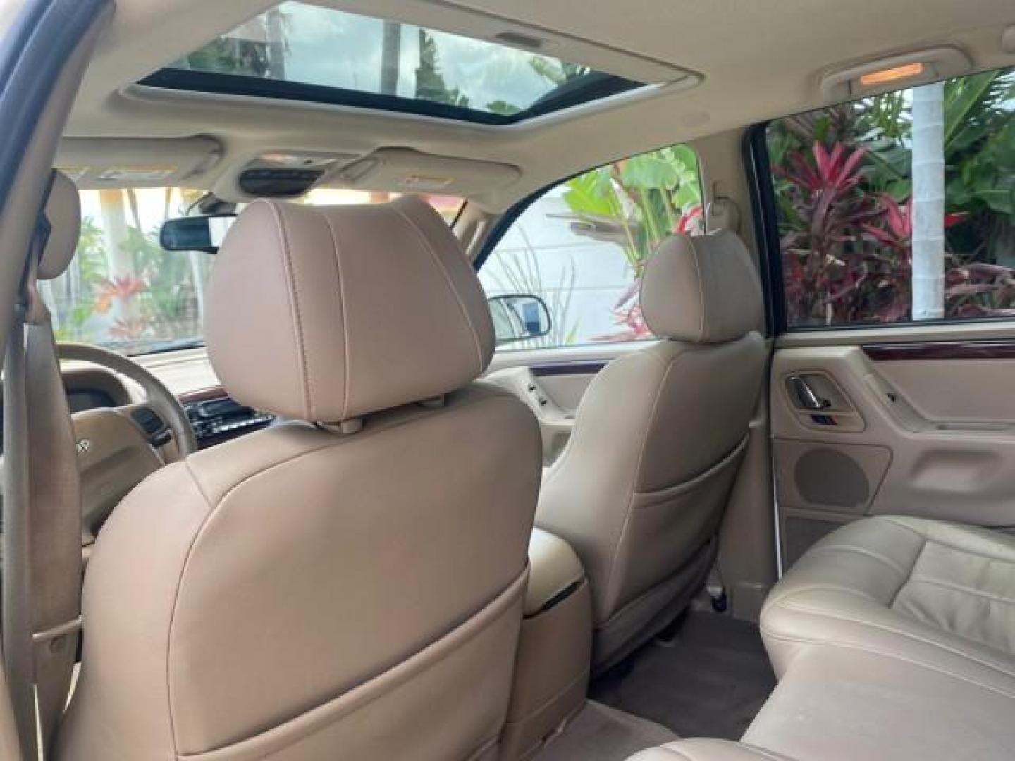 2004 Stone White /Sandstone Jeep Grand Cherokee Limited 4WD SUNROOF (1J8GW58N14C) with an 4.7L 8-Cyl Engine engine, Automatic transmission, located at 4701 North Dixie Hwy, Pompano Beach, FL, 33064, (954) 422-2889, 26.240938, -80.123474 - OUR WEBPAGE FLORIDACARS1.COM HAS OVER 100 PHOTOS AND FREE CARFAX LINK 2004 JEEP GRAND CHEROKEE LIMITED A TRUE CLASSIC WONT LAST IN STOCK VIN: 1J8GW58N14C199129 1 J 8 G W 5 8 N 1 4 C 1 9 9 1 2 9 4 DOOR WAGON/SPORT UTILITY 4.7L V8 F SOHC TOW PKG AND FRONT TOW HITCH WITH PLUG GASOLINE REAR WHEEL DRIVE - Photo#62