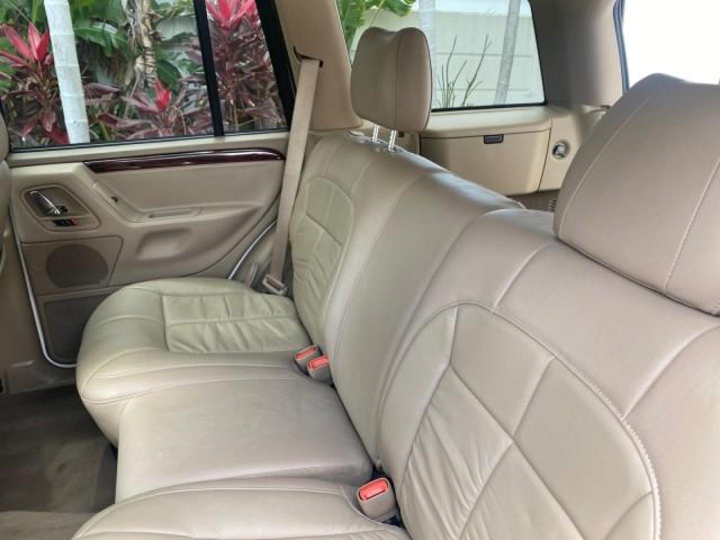 2004 Stone White /Sandstone Jeep Grand Cherokee Limited 4WD SUNROOF (1J8GW58N14C) with an 4.7L 8-Cyl Engine engine, Automatic transmission, located at 4701 North Dixie Hwy, Pompano Beach, FL, 33064, (954) 422-2889, 26.240938, -80.123474 - OUR WEBPAGE FLORIDACARS1.COM HAS OVER 100 PHOTOS AND FREE CARFAX LINK 2004 JEEP GRAND CHEROKEE LIMITED A TRUE CLASSIC WONT LAST IN STOCK VIN: 1J8GW58N14C199129 1 J 8 G W 5 8 N 1 4 C 1 9 9 1 2 9 4 DOOR WAGON/SPORT UTILITY 4.7L V8 F SOHC TOW PKG AND FRONT TOW HITCH WITH PLUG GASOLINE REAR WHEEL DRIVE - Photo#64