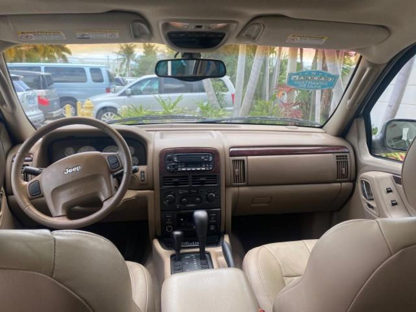 2004 Stone White /Sandstone Jeep Grand Cherokee Limited 4WD SUNROOF (1J8GW58N14C) with an 4.7L 8-Cyl Engine engine, Automatic transmission, located at 4701 North Dixie Hwy, Pompano Beach, FL, 33064, (954) 422-2889, 26.240938, -80.123474 - OUR WEBPAGE FLORIDACARS1.COM HAS OVER 100 PHOTOS AND FREE CARFAX LINK 2004 JEEP GRAND CHEROKEE LIMITED A TRUE CLASSIC WONT LAST IN STOCK VIN: 1J8GW58N14C199129 1 J 8 G W 5 8 N 1 4 C 1 9 9 1 2 9 4 DOOR WAGON/SPORT UTILITY 4.7L V8 F SOHC TOW PKG AND FRONT TOW HITCH WITH PLUG GASOLINE REAR WHEEL DRIVE - Photo#66