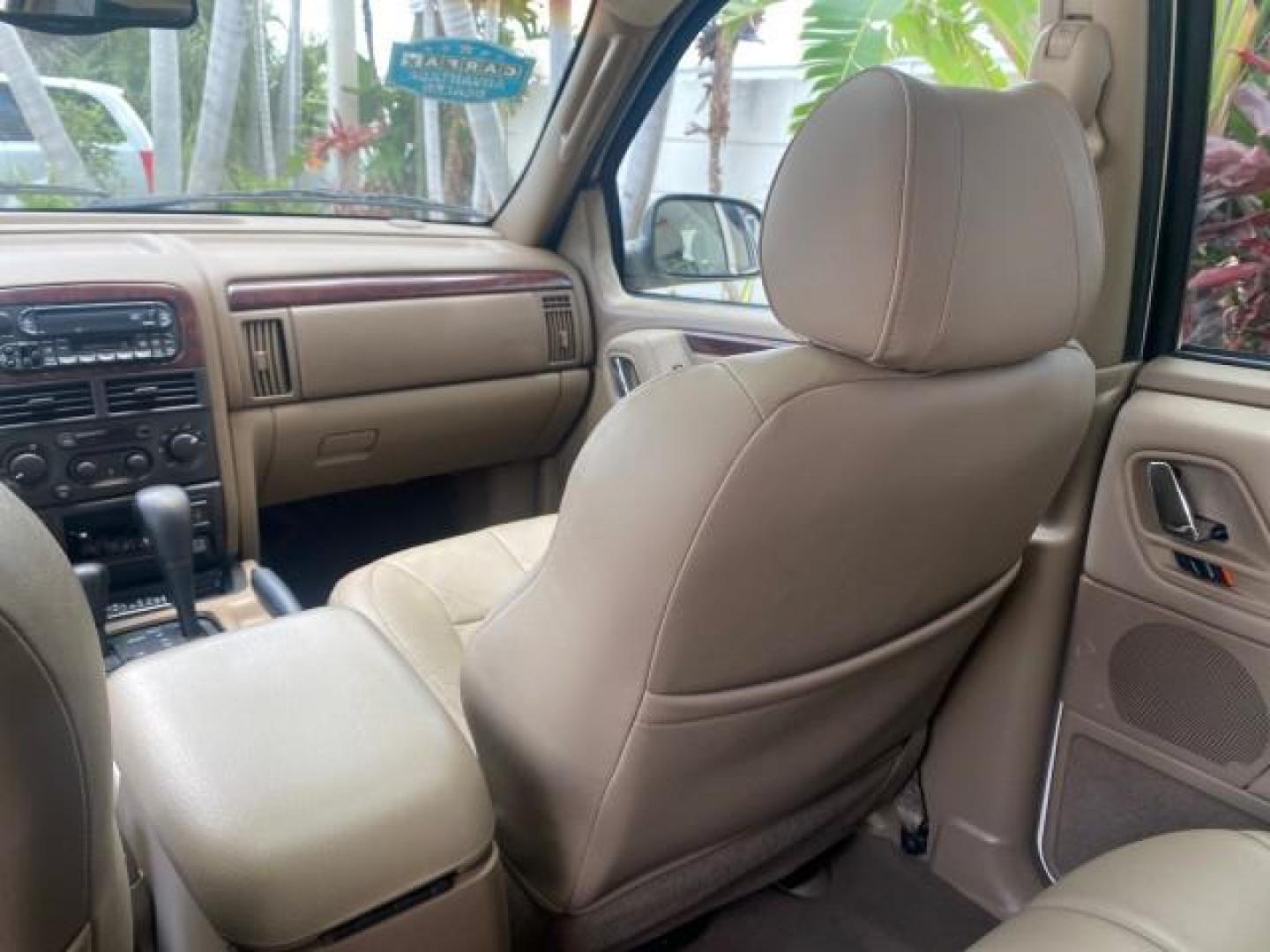 2004 Stone White /Sandstone Jeep Grand Cherokee Limited 4WD SUNROOF (1J8GW58N14C) with an 4.7L 8-Cyl Engine engine, Automatic transmission, located at 4701 North Dixie Hwy, Pompano Beach, FL, 33064, (954) 422-2889, 26.240938, -80.123474 - OUR WEBPAGE FLORIDACARS1.COM HAS OVER 100 PHOTOS AND FREE CARFAX LINK 2004 JEEP GRAND CHEROKEE LIMITED A TRUE CLASSIC WONT LAST IN STOCK VIN: 1J8GW58N14C199129 1 J 8 G W 5 8 N 1 4 C 1 9 9 1 2 9 4 DOOR WAGON/SPORT UTILITY 4.7L V8 F SOHC TOW PKG AND FRONT TOW HITCH WITH PLUG GASOLINE REAR WHEEL DRIVE - Photo#68