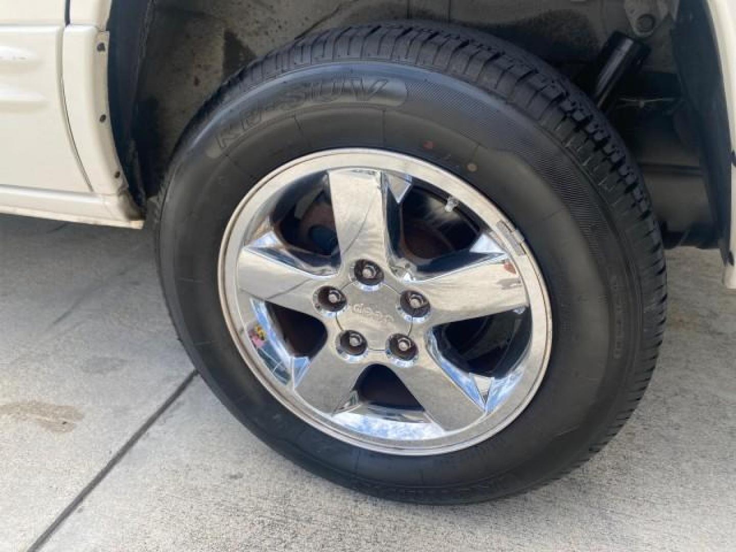 2004 Stone White /Sandstone Jeep Grand Cherokee Limited 4WD SUNROOF (1J8GW58N14C) with an 4.7L 8-Cyl Engine engine, Automatic transmission, located at 4701 North Dixie Hwy, Pompano Beach, FL, 33064, (954) 422-2889, 26.240938, -80.123474 - OUR WEBPAGE FLORIDACARS1.COM HAS OVER 100 PHOTOS AND FREE CARFAX LINK 2004 JEEP GRAND CHEROKEE LIMITED A TRUE CLASSIC WONT LAST IN STOCK VIN: 1J8GW58N14C199129 1 J 8 G W 5 8 N 1 4 C 1 9 9 1 2 9 4 DOOR WAGON/SPORT UTILITY 4.7L V8 F SOHC TOW PKG AND FRONT TOW HITCH WITH PLUG GASOLINE REAR WHEEL DRIVE - Photo#69