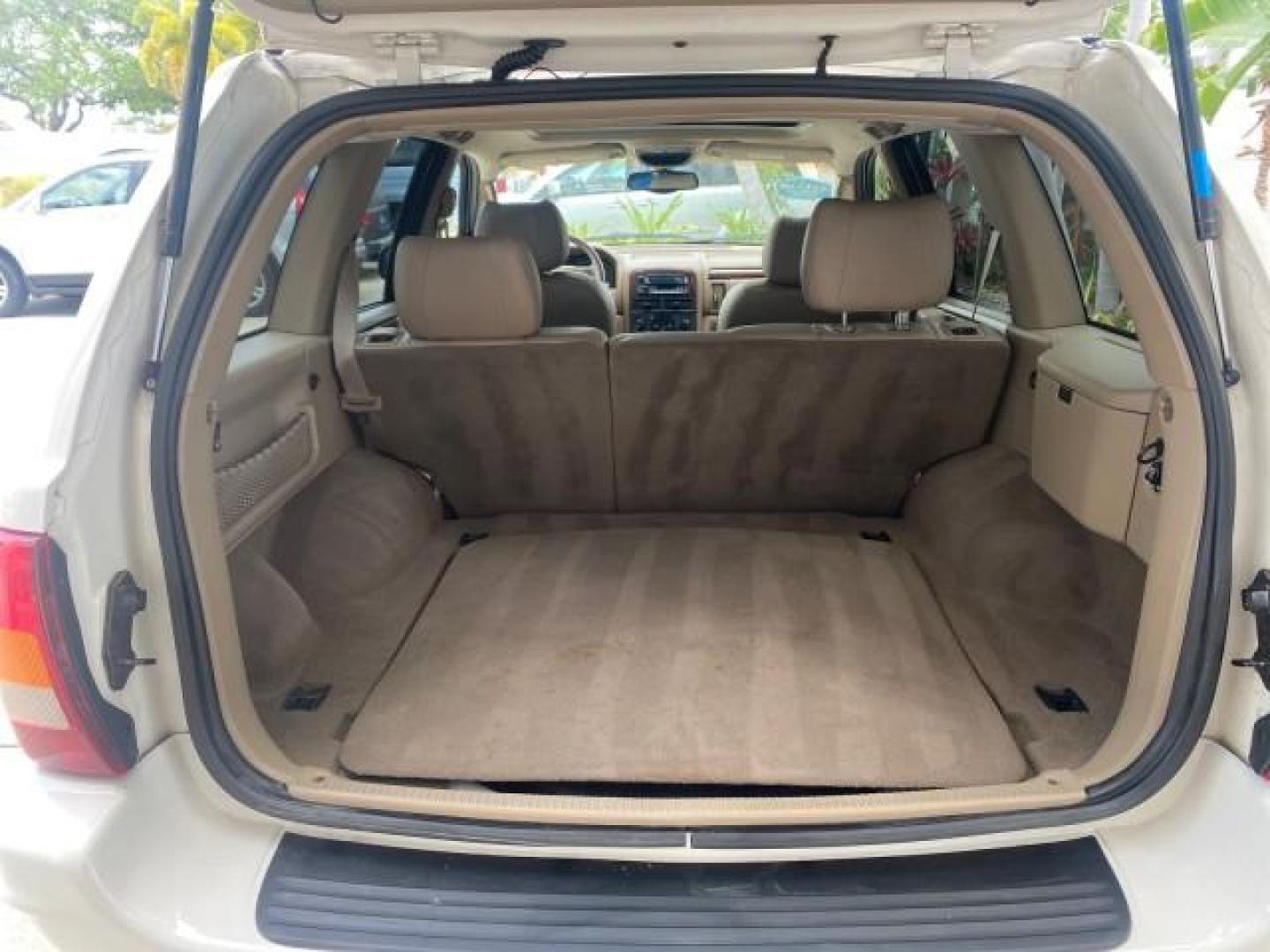 2004 Stone White /Sandstone Jeep Grand Cherokee Limited 4WD SUNROOF (1J8GW58N14C) with an 4.7L 8-Cyl Engine engine, Automatic transmission, located at 4701 North Dixie Hwy, Pompano Beach, FL, 33064, (954) 422-2889, 26.240938, -80.123474 - OUR WEBPAGE FLORIDACARS1.COM HAS OVER 100 PHOTOS AND FREE CARFAX LINK 2004 JEEP GRAND CHEROKEE LIMITED A TRUE CLASSIC WONT LAST IN STOCK VIN: 1J8GW58N14C199129 1 J 8 G W 5 8 N 1 4 C 1 9 9 1 2 9 4 DOOR WAGON/SPORT UTILITY 4.7L V8 F SOHC TOW PKG AND FRONT TOW HITCH WITH PLUG GASOLINE REAR WHEEL DRIVE - Photo#79