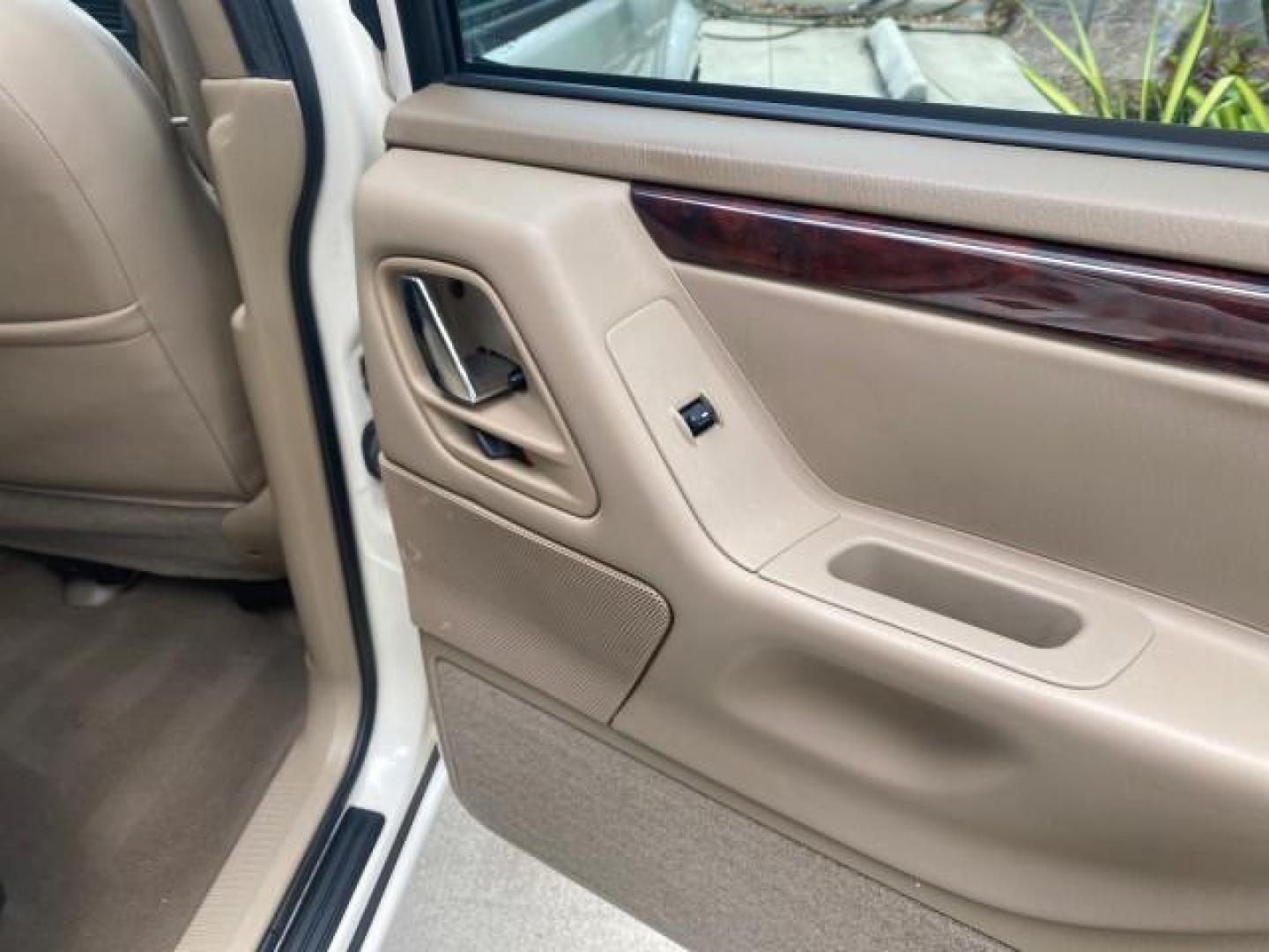 2004 Stone White /Sandstone Jeep Grand Cherokee Limited 4WD SUNROOF (1J8GW58N14C) with an 4.7L 8-Cyl Engine engine, Automatic transmission, located at 4701 North Dixie Hwy, Pompano Beach, FL, 33064, (954) 422-2889, 26.240938, -80.123474 - OUR WEBPAGE FLORIDACARS1.COM HAS OVER 100 PHOTOS AND FREE CARFAX LINK 2004 JEEP GRAND CHEROKEE LIMITED A TRUE CLASSIC WONT LAST IN STOCK VIN: 1J8GW58N14C199129 1 J 8 G W 5 8 N 1 4 C 1 9 9 1 2 9 4 DOOR WAGON/SPORT UTILITY 4.7L V8 F SOHC TOW PKG AND FRONT TOW HITCH WITH PLUG GASOLINE REAR WHEEL DRIVE - Photo#85