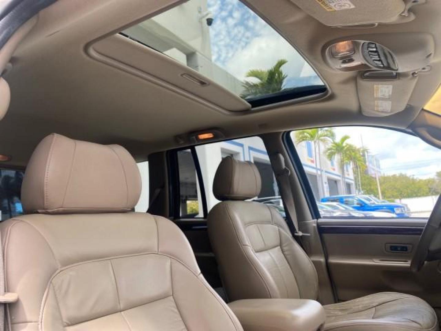 2004 Stone White /Sandstone Jeep Grand Cherokee Limited 4WD SUNROOF (1J8GW58N14C) with an 4.7L 8-Cyl Engine engine, Automatic transmission, located at 4701 North Dixie Hwy, Pompano Beach, FL, 33064, (954) 422-2889, 26.240938, -80.123474 - OUR WEBPAGE FLORIDACARS1.COM HAS OVER 100 PHOTOS AND FREE CARFAX LINK 2004 JEEP GRAND CHEROKEE LIMITED A TRUE CLASSIC WONT LAST IN STOCK VIN: 1J8GW58N14C199129 1 J 8 G W 5 8 N 1 4 C 1 9 9 1 2 9 4 DOOR WAGON/SPORT UTILITY 4.7L V8 F SOHC TOW PKG AND FRONT TOW HITCH WITH PLUG GASOLINE REAR WHEEL DRIVE - Photo#95