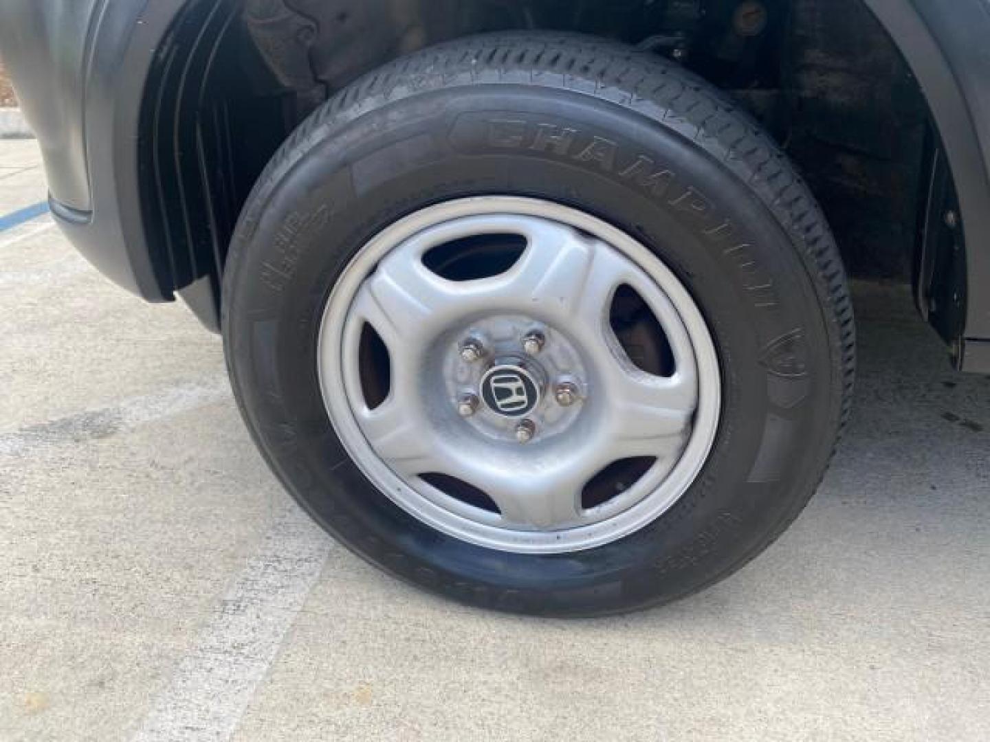 2004 Satin Silver Metallic /Black Honda CR-V LX FLORIDA 22 SERVICES (SHSRD68494U) with an 2.4L DOHC PGM-FI 16-Valve i-VTEC I4 Engine engine, Automatic transmission, located at 4701 North Dixie Hwy, Pompano Beach, FL, 33064, (954) 422-2889, 26.240938, -80.123474 - OUR WEBPAGE FLORIDACARS1.COM HAS OVER 100 PHOTOS AND FREE CARFAX LINK 2004 HONDA CR-V LX VIN: SHSRD68494U204432 S H S R D 6 8 4 9 4 U 2 0 4 4 3 2 4 DOOR WAGON/SPORT UTILITY 2.4L I4 F SOHC GASOLINE 29 MPG FRONT WHEEL DRIVE Top Features Leatherette and Cloth Basic Features AM/FM Stereo CD Audio Powe - Photo#19