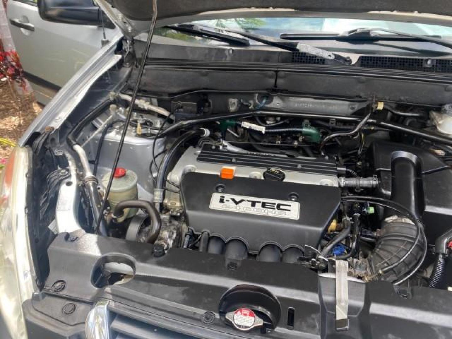 2004 Satin Silver Metallic /Black Honda CR-V LX FLORIDA 22 SERVICES (SHSRD68494U) with an 2.4L DOHC PGM-FI 16-Valve i-VTEC I4 Engine engine, Automatic transmission, located at 4701 North Dixie Hwy, Pompano Beach, FL, 33064, (954) 422-2889, 26.240938, -80.123474 - OUR WEBPAGE FLORIDACARS1.COM HAS OVER 100 PHOTOS AND FREE CARFAX LINK 2004 HONDA CR-V LX VIN: SHSRD68494U204432 S H S R D 6 8 4 9 4 U 2 0 4 4 3 2 4 DOOR WAGON/SPORT UTILITY 2.4L I4 F SOHC GASOLINE 29 MPG FRONT WHEEL DRIVE Top Features Leatherette and Cloth Basic Features AM/FM Stereo CD Audio Powe - Photo#24