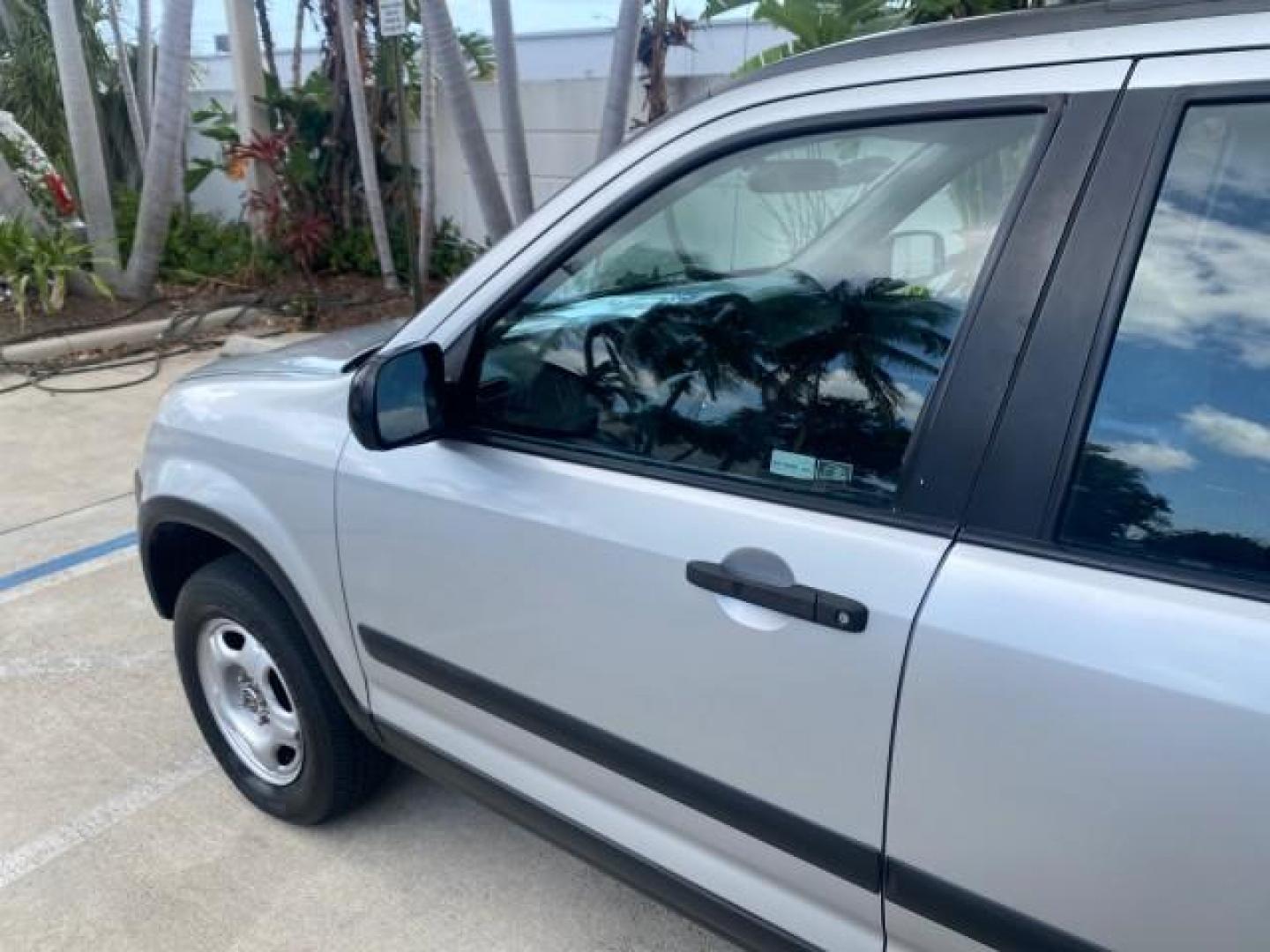 2004 Satin Silver Metallic /Black Honda CR-V LX FLORIDA 22 SERVICES (SHSRD68494U) with an 2.4L DOHC PGM-FI 16-Valve i-VTEC I4 Engine engine, Automatic transmission, located at 4701 North Dixie Hwy, Pompano Beach, FL, 33064, (954) 422-2889, 26.240938, -80.123474 - OUR WEBPAGE FLORIDACARS1.COM HAS OVER 100 PHOTOS AND FREE CARFAX LINK 2004 HONDA CR-V LX VIN: SHSRD68494U204432 S H S R D 6 8 4 9 4 U 2 0 4 4 3 2 4 DOOR WAGON/SPORT UTILITY 2.4L I4 F SOHC GASOLINE 29 MPG FRONT WHEEL DRIVE Top Features Leatherette and Cloth Basic Features AM/FM Stereo CD Audio Powe - Photo#26