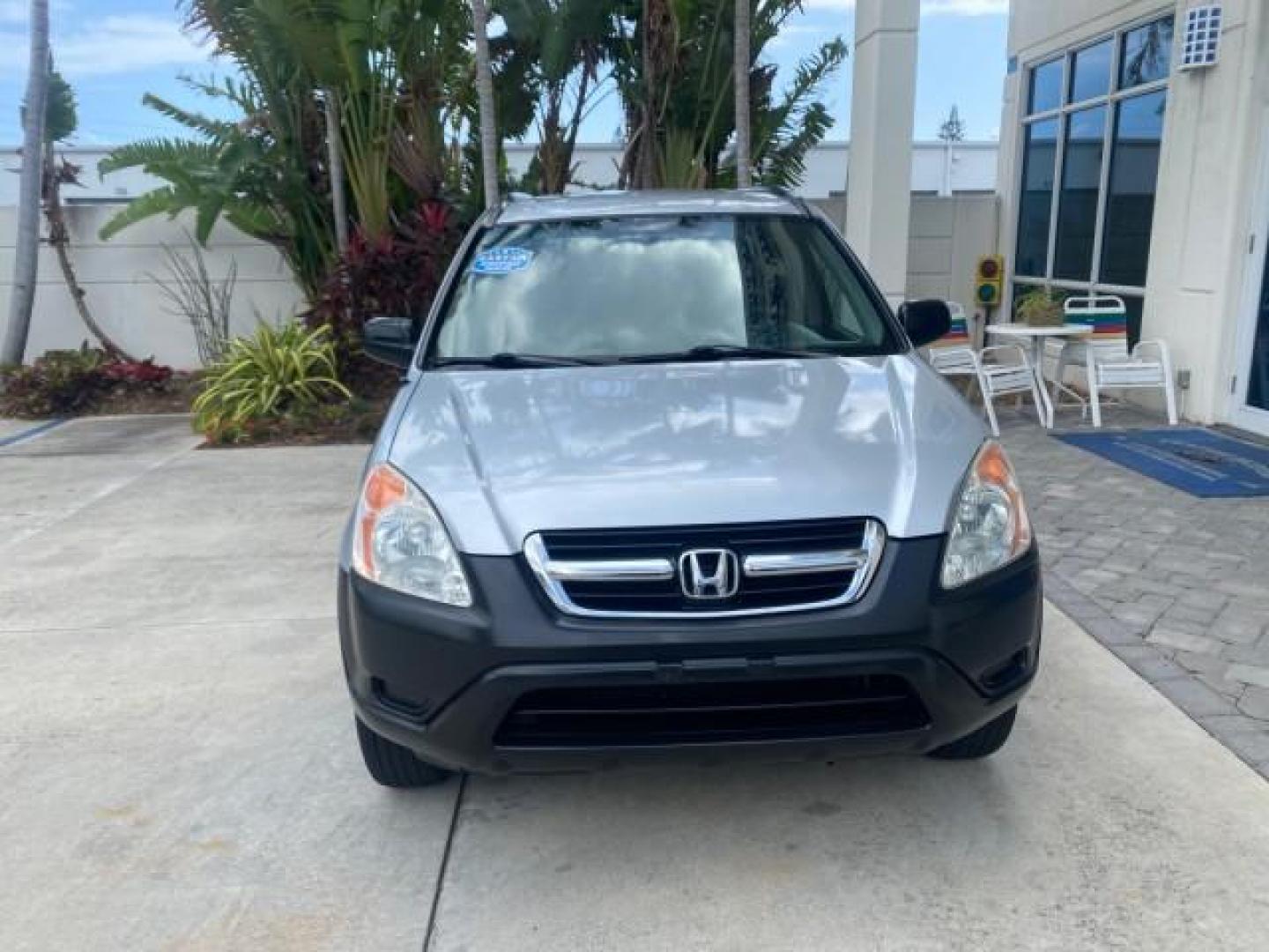 2004 Satin Silver Metallic /Black Honda CR-V LX FLORIDA 22 SERVICES (SHSRD68494U) with an 2.4L DOHC PGM-FI 16-Valve i-VTEC I4 Engine engine, Automatic transmission, located at 4701 North Dixie Hwy, Pompano Beach, FL, 33064, (954) 422-2889, 26.240938, -80.123474 - OUR WEBPAGE FLORIDACARS1.COM HAS OVER 100 PHOTOS AND FREE CARFAX LINK 2004 HONDA CR-V LX VIN: SHSRD68494U204432 S H S R D 6 8 4 9 4 U 2 0 4 4 3 2 4 DOOR WAGON/SPORT UTILITY 2.4L I4 F SOHC GASOLINE 29 MPG FRONT WHEEL DRIVE Top Features Leatherette and Cloth Basic Features AM/FM Stereo CD Audio Powe - Photo#2