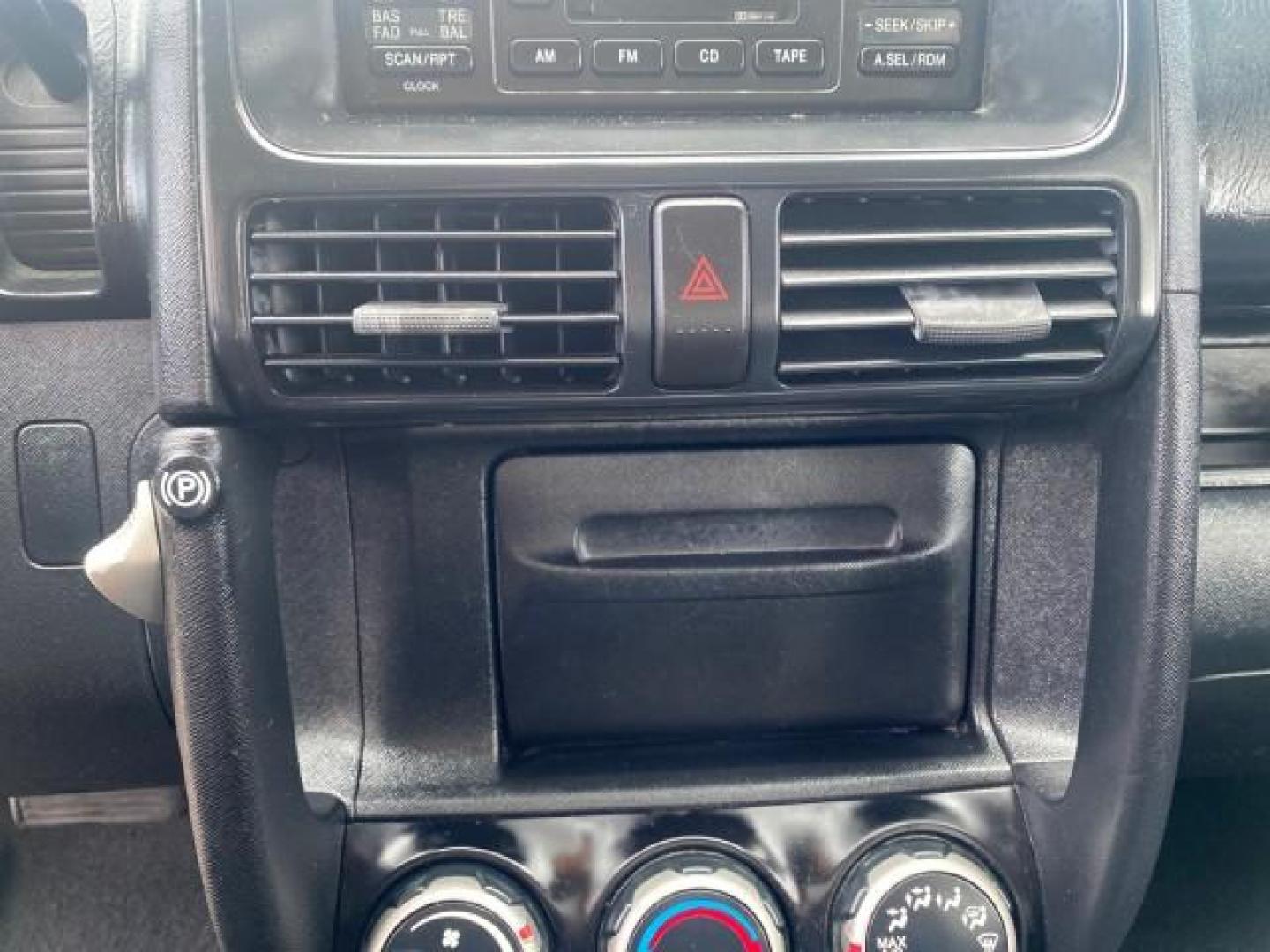 2004 Satin Silver Metallic /Black Honda CR-V LX FLORIDA 22 SERVICES (SHSRD68494U) with an 2.4L DOHC PGM-FI 16-Valve i-VTEC I4 Engine engine, Automatic transmission, located at 4701 North Dixie Hwy, Pompano Beach, FL, 33064, (954) 422-2889, 26.240938, -80.123474 - OUR WEBPAGE FLORIDACARS1.COM HAS OVER 100 PHOTOS AND FREE CARFAX LINK 2004 HONDA CR-V LX VIN: SHSRD68494U204432 S H S R D 6 8 4 9 4 U 2 0 4 4 3 2 4 DOOR WAGON/SPORT UTILITY 2.4L I4 F SOHC GASOLINE 29 MPG FRONT WHEEL DRIVE Top Features Leatherette and Cloth Basic Features AM/FM Stereo CD Audio Powe - Photo#47