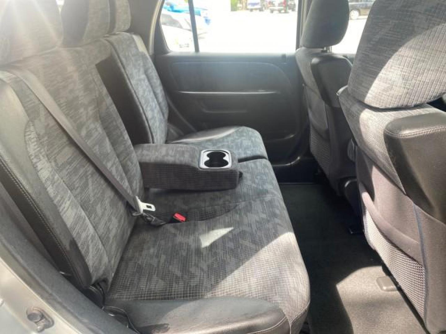 2004 Satin Silver Metallic /Black Honda CR-V LX FLORIDA 22 SERVICES (SHSRD68494U) with an 2.4L DOHC PGM-FI 16-Valve i-VTEC I4 Engine engine, Automatic transmission, located at 4701 North Dixie Hwy, Pompano Beach, FL, 33064, (954) 422-2889, 26.240938, -80.123474 - OUR WEBPAGE FLORIDACARS1.COM HAS OVER 100 PHOTOS AND FREE CARFAX LINK 2004 HONDA CR-V LX VIN: SHSRD68494U204432 S H S R D 6 8 4 9 4 U 2 0 4 4 3 2 4 DOOR WAGON/SPORT UTILITY 2.4L I4 F SOHC GASOLINE 29 MPG FRONT WHEEL DRIVE Top Features Leatherette and Cloth Basic Features AM/FM Stereo CD Audio Powe - Photo#81