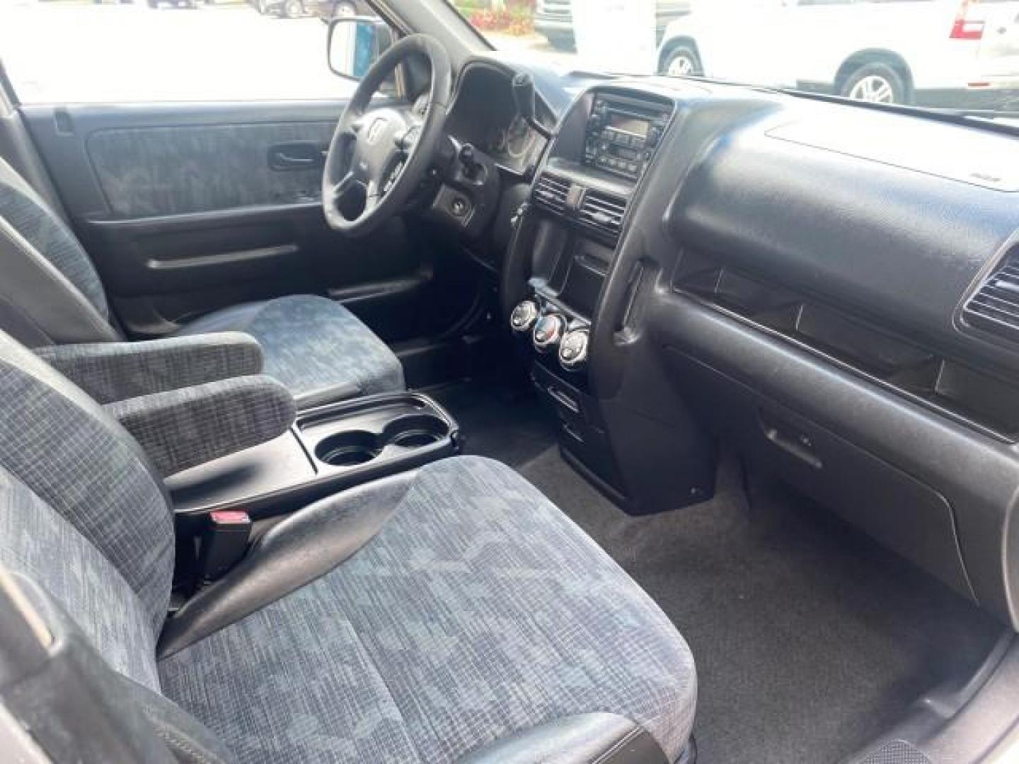2004 Satin Silver Metallic /Black Honda CR-V LX FLORIDA 22 SERVICES (SHSRD68494U) with an 2.4L DOHC PGM-FI 16-Valve i-VTEC I4 Engine engine, Automatic transmission, located at 4701 North Dixie Hwy, Pompano Beach, FL, 33064, (954) 422-2889, 26.240938, -80.123474 - OUR WEBPAGE FLORIDACARS1.COM HAS OVER 100 PHOTOS AND FREE CARFAX LINK 2004 HONDA CR-V LX VIN: SHSRD68494U204432 S H S R D 6 8 4 9 4 U 2 0 4 4 3 2 4 DOOR WAGON/SPORT UTILITY 2.4L I4 F SOHC GASOLINE 29 MPG FRONT WHEEL DRIVE Top Features Leatherette and Cloth Basic Features AM/FM Stereo CD Audio Powe - Photo#87