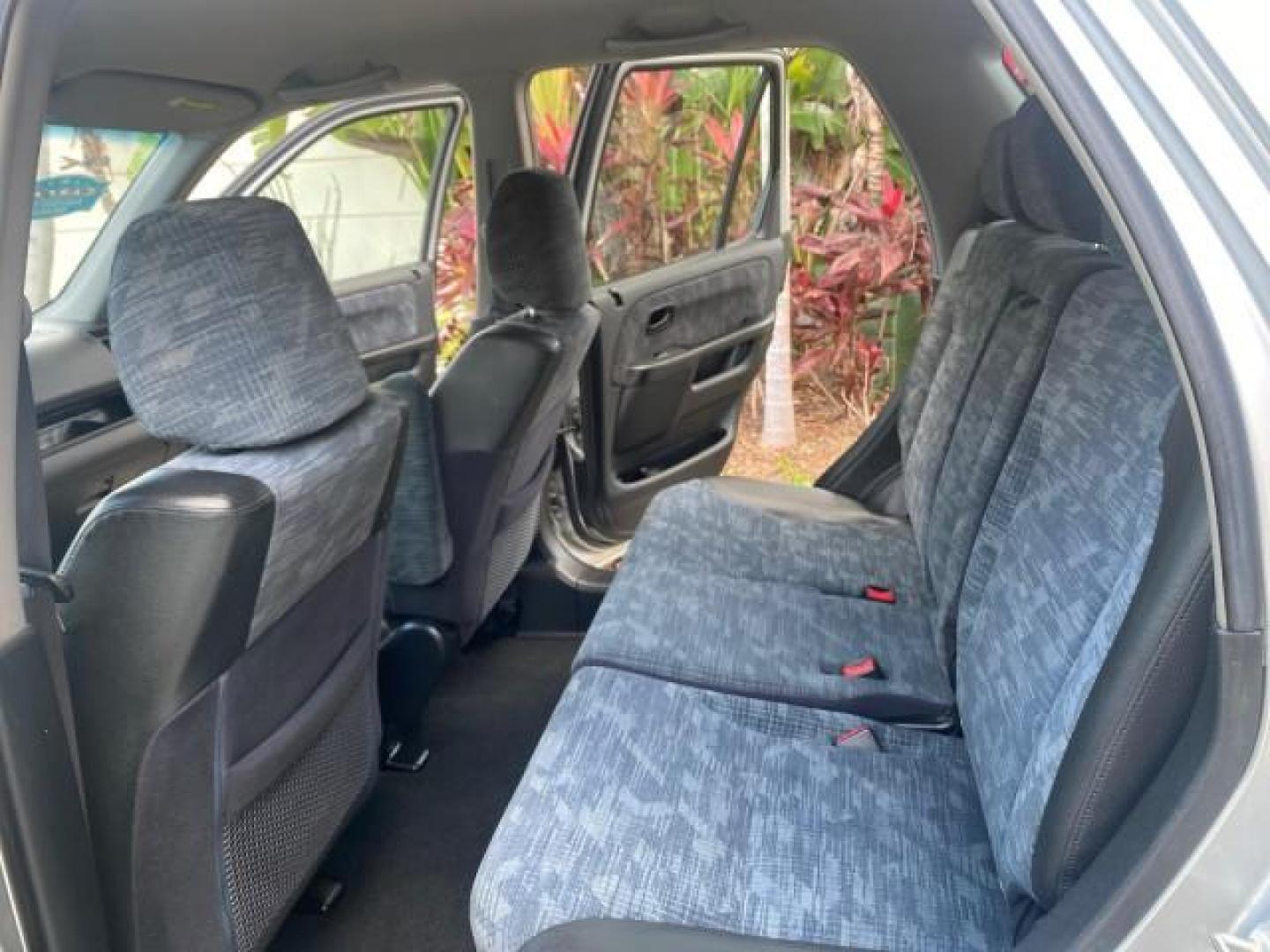 2004 Satin Silver Metallic /Black Honda CR-V LX LOW MILES 44,323 (SHSRD684X4U) with an 2.4L DOHC PGM-FI 16-Valve i-VTEC I4 Engine engine, Automatic transmission, located at 4701 North Dixie Hwy, Pompano Beach, FL, 33064, (954) 422-2889, 26.240938, -80.123474 - OUR WEBPAGE FLORIDACARS1.COM HAS OVER 100 PHOTOS AND FREE CARFAX LINK 2004 HONDA CR-V LX VIN: SHSRD684X4U202379 S H S R D 6 8 4 X 4 U 2 0 2 3 7 9 4 DOOR WAGON/SPORT UTILITY 2.4L I4 F SOHC GASOLINE 29 MPG FRONT WHEEL DRIVE Top Features Leatherette and Cloth Basic Features AM/FM Stereo CD Audio Powe - Photo#14