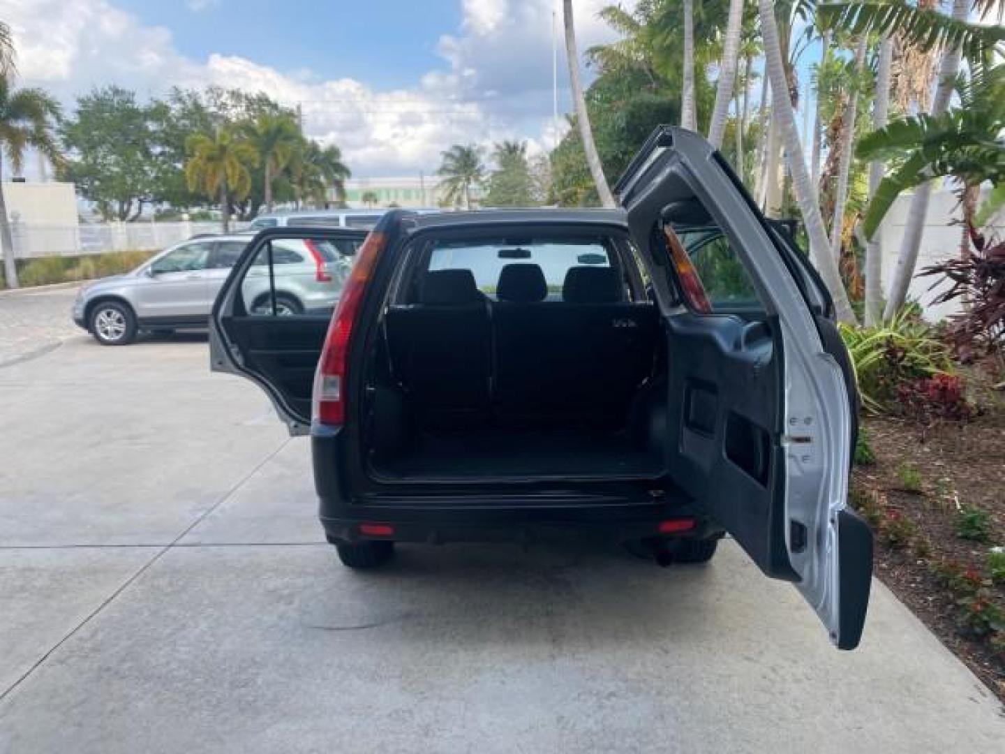 2004 Satin Silver Metallic /Black Honda CR-V LX LOW MILES 44,323 (SHSRD684X4U) with an 2.4L DOHC PGM-FI 16-Valve i-VTEC I4 Engine engine, Automatic transmission, located at 4701 North Dixie Hwy, Pompano Beach, FL, 33064, (954) 422-2889, 26.240938, -80.123474 - OUR WEBPAGE FLORIDACARS1.COM HAS OVER 100 PHOTOS AND FREE CARFAX LINK 2004 HONDA CR-V LX VIN: SHSRD684X4U202379 S H S R D 6 8 4 X 4 U 2 0 2 3 7 9 4 DOOR WAGON/SPORT UTILITY 2.4L I4 F SOHC GASOLINE 29 MPG FRONT WHEEL DRIVE Top Features Leatherette and Cloth Basic Features AM/FM Stereo CD Audio Powe - Photo#15